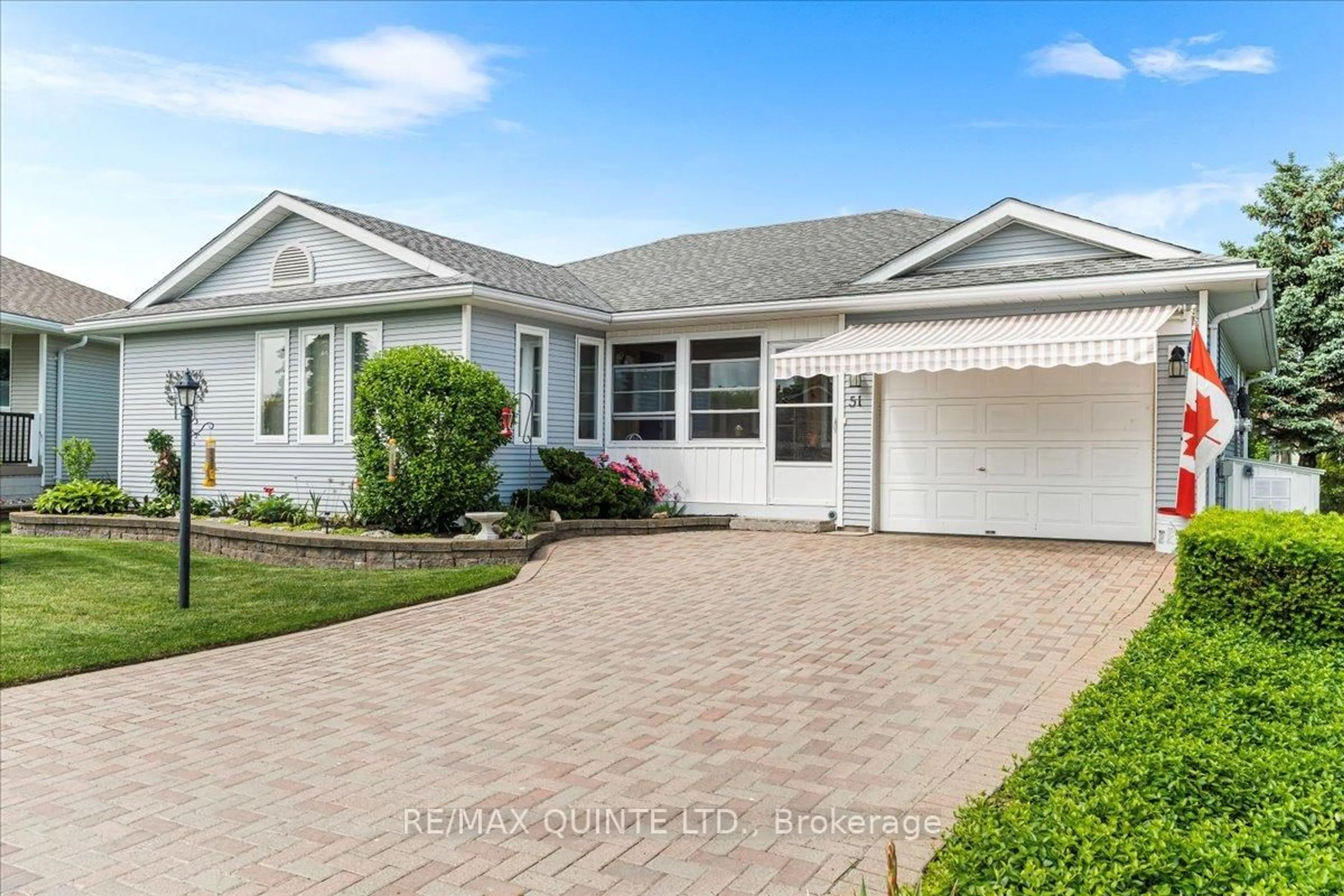 Home with vinyl exterior material, street for 51 Cretney Dr, Prince Edward County Ontario K0K 3L0