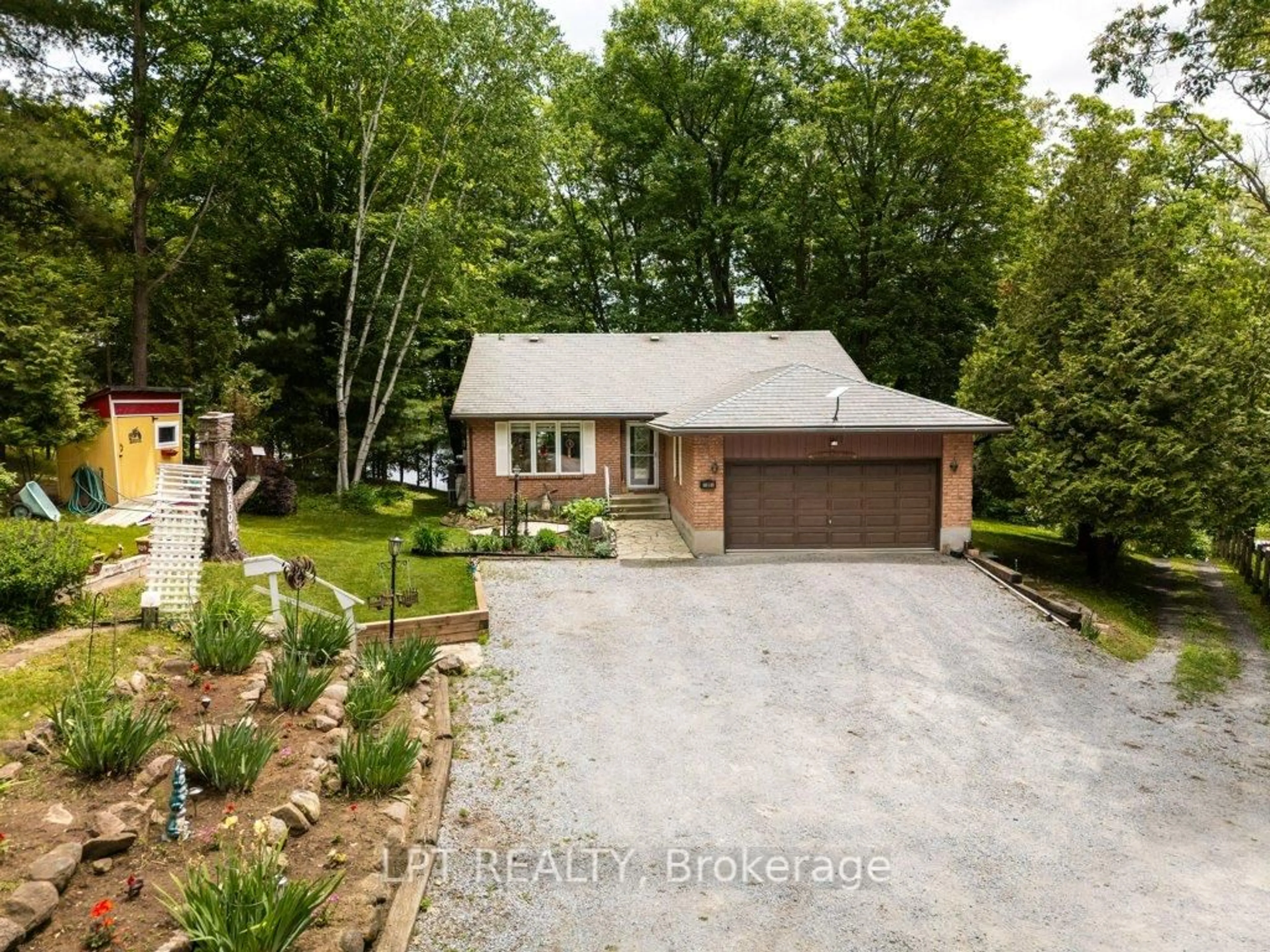 A pic from outside/outdoor area/front of a property/back of a property/a pic from drone, unknown for 31 Acorn Lane, Tichborne Ontario K0H 2V0