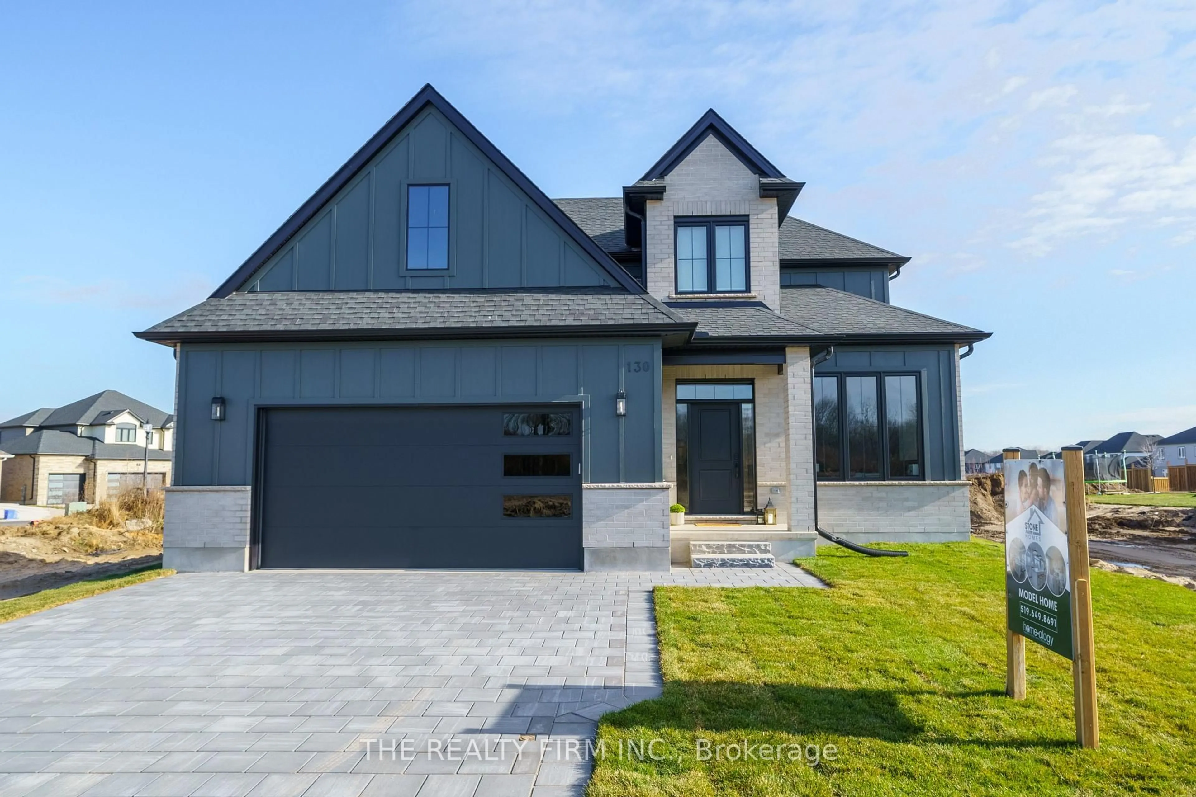 Home with brick exterior material, street for 130 Harvest Lane, Thames Centre Ontario N0L 1G2