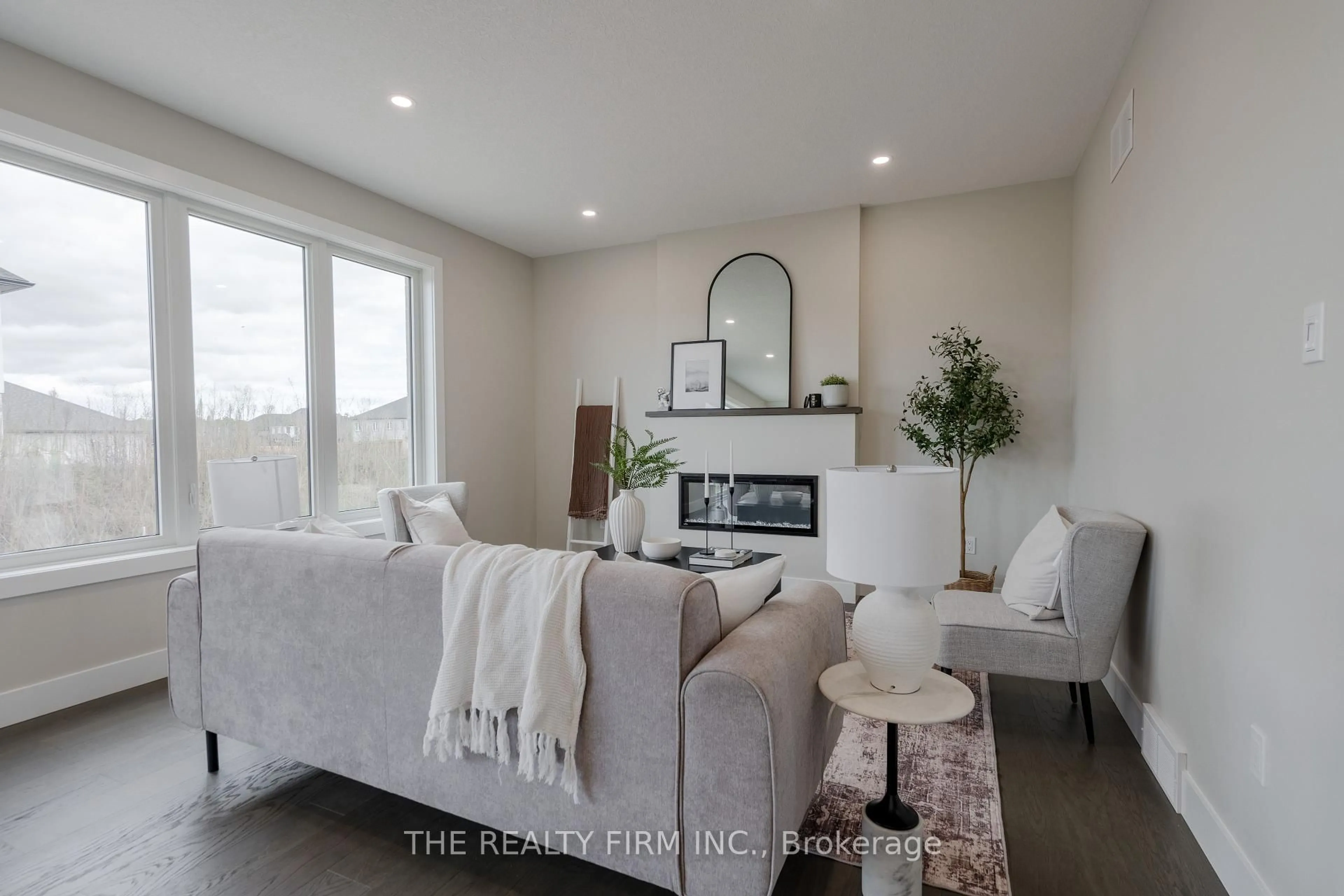 Living room with furniture, unknown for 130 Harvest Lane, Thames Centre Ontario N0L 1G2