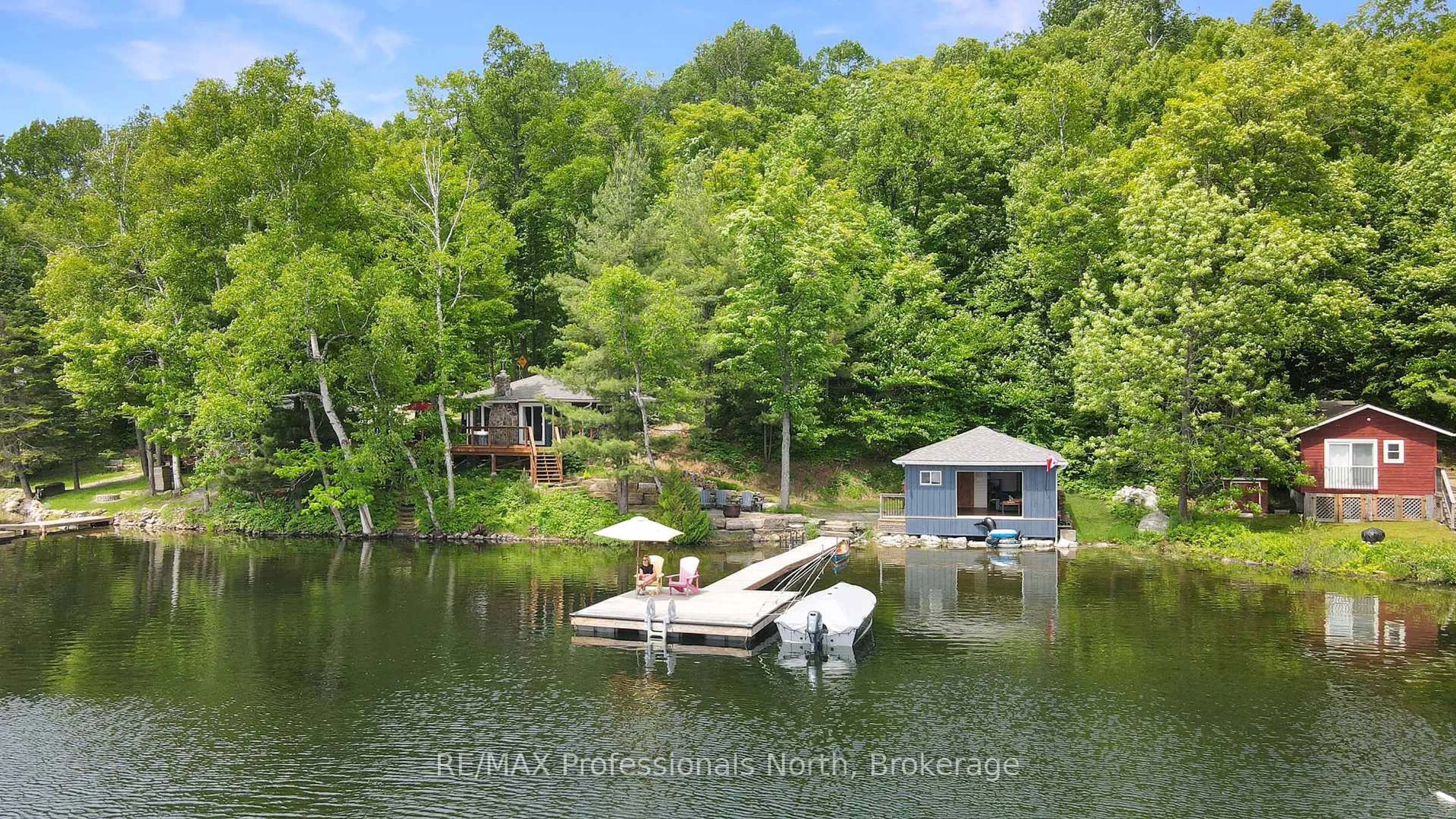 A pic from outside/outdoor area/front of a property/back of a property/a pic from drone, water/lake/river/ocean view for 1027 Rothwell Dr, Highlands East Ontario K0L 3C0