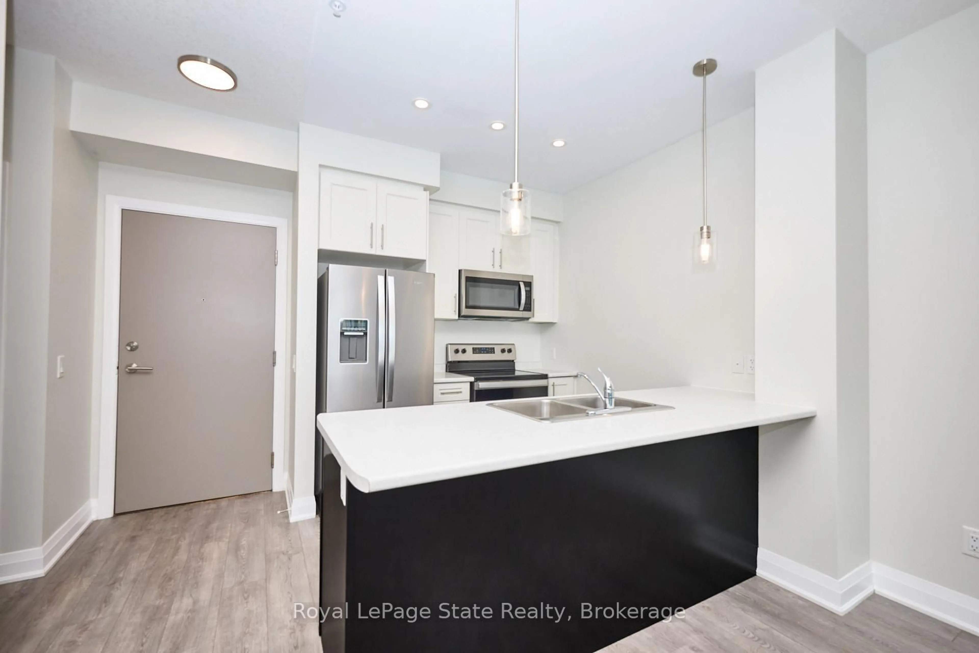 Open concept kitchen, unknown for 16 Concord Pl #301, Grimsby Ontario L3M 0J1