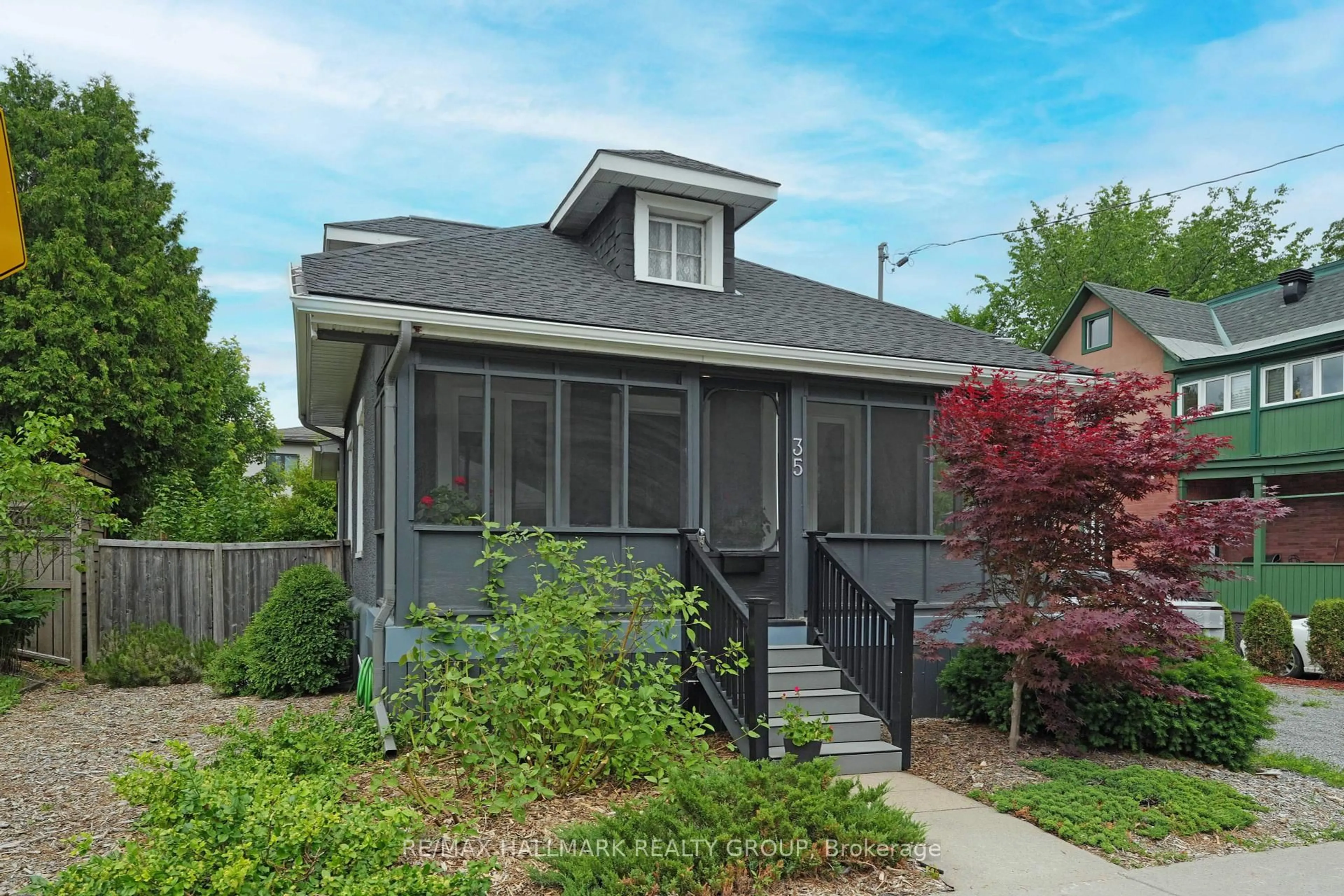 Home with vinyl exterior material, street for 35 Queen Mary St, Ottawa Ontario K1K 1X8