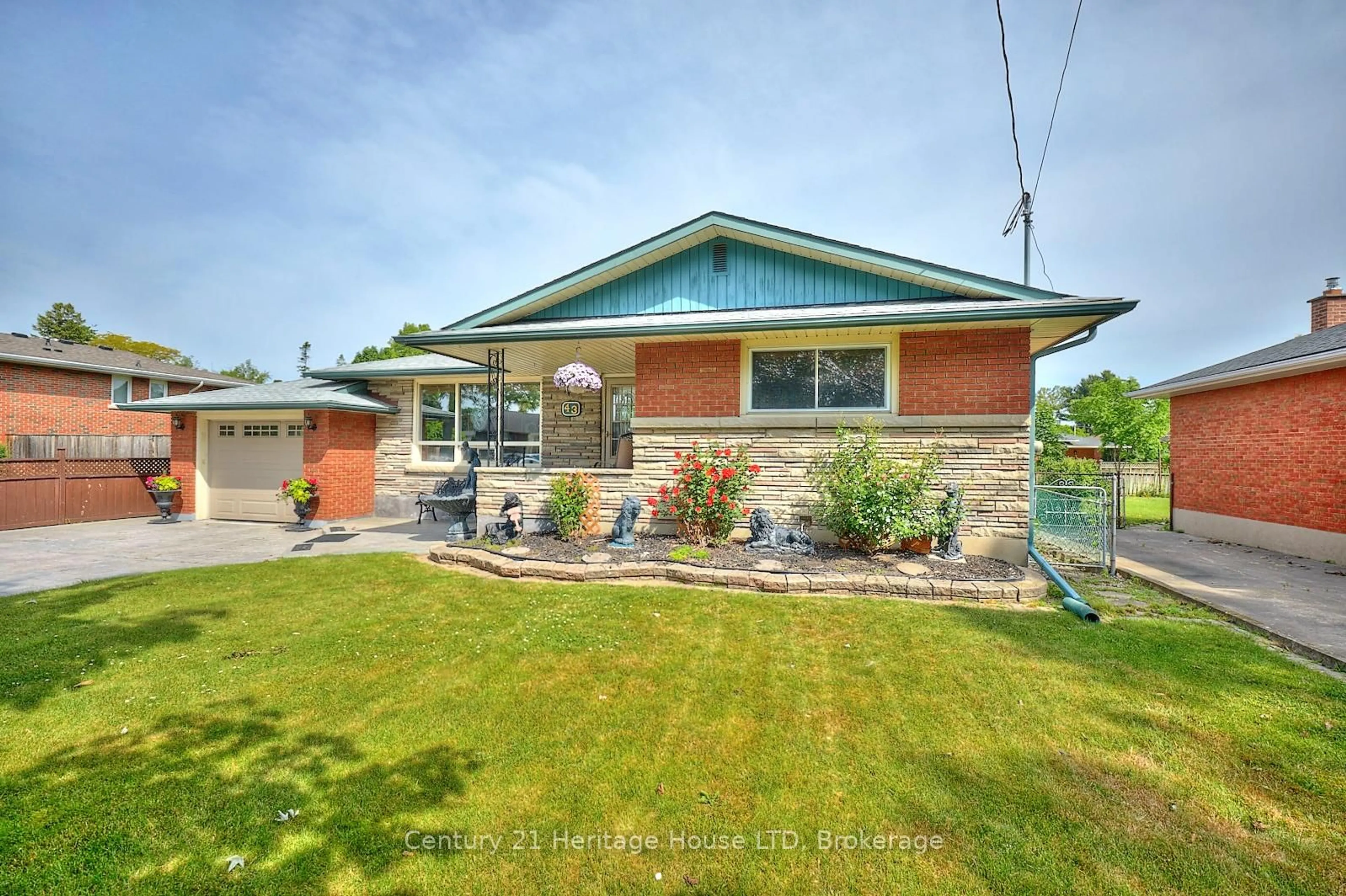 Home with brick exterior material, street for 43 Parnell Rd, St. Catharines Ontario L2N 2W5