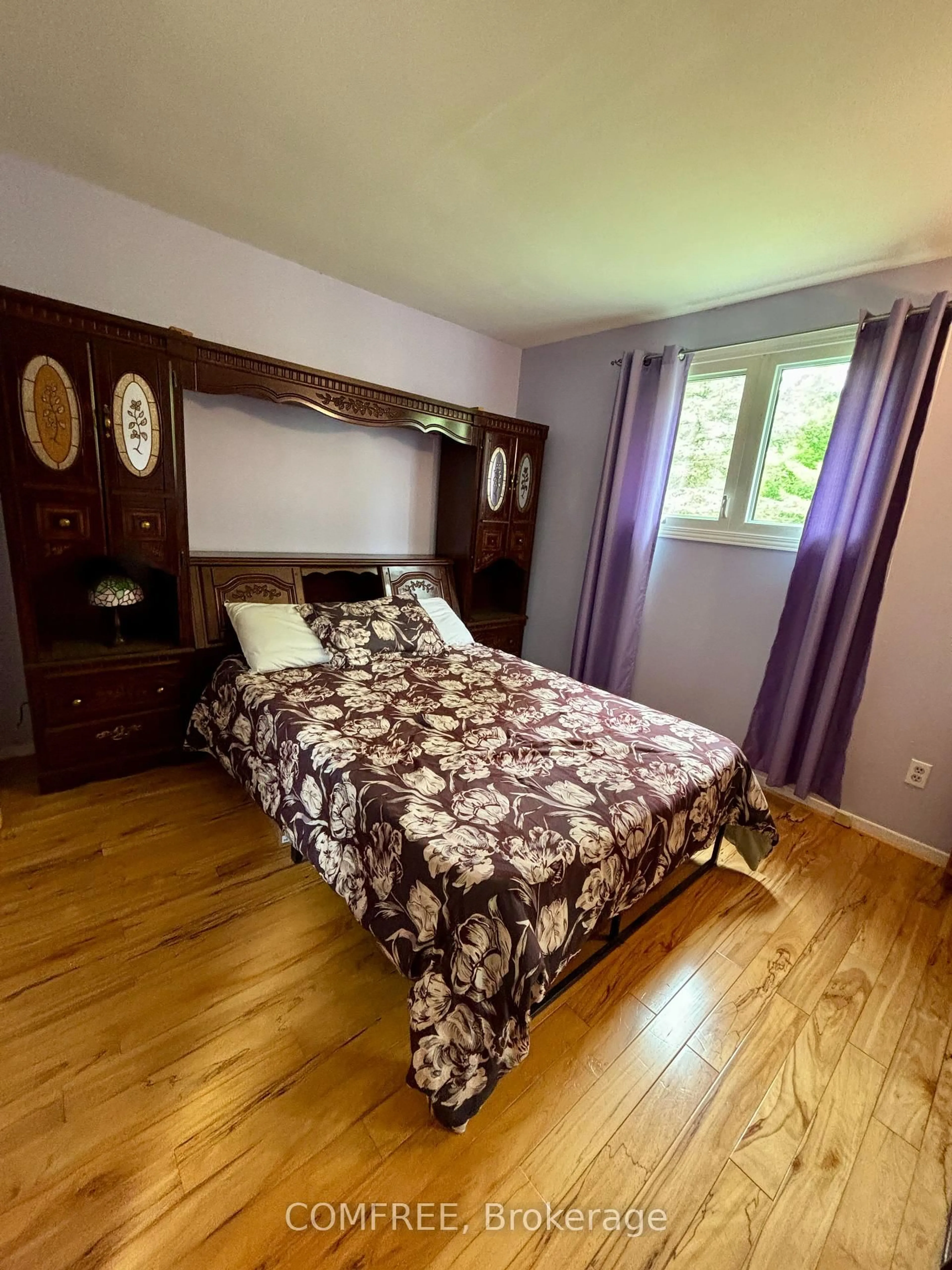 Bedroom with bed, wood/laminate floor for 8770 Bank St, Vernon Ontario K0A 3J0