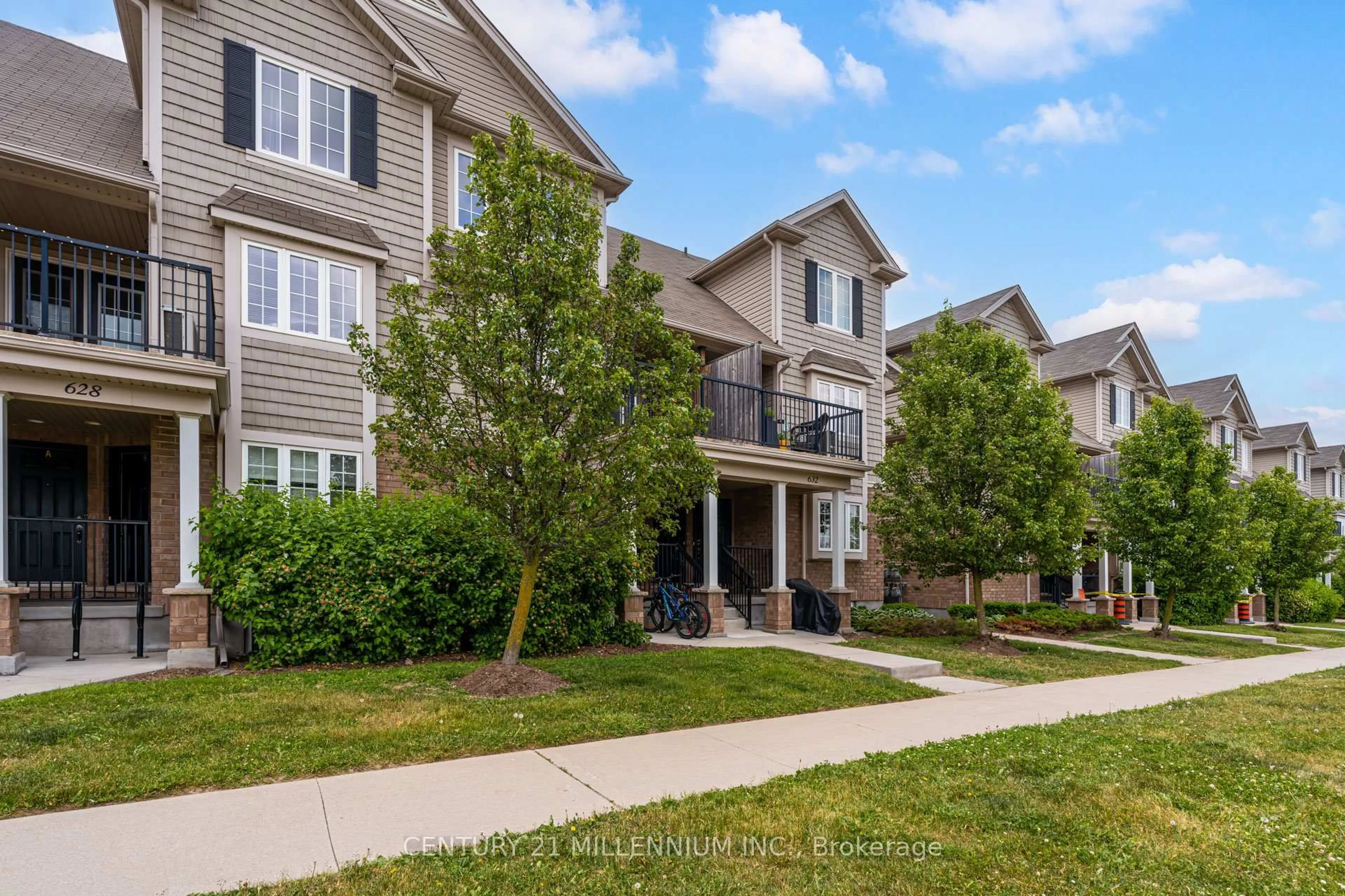 A pic from outside/outdoor area/front of a property/back of a property/a pic from drone, unknown for 630 Woodlawn Rd #A, Guelph Ontario N1E 0K4