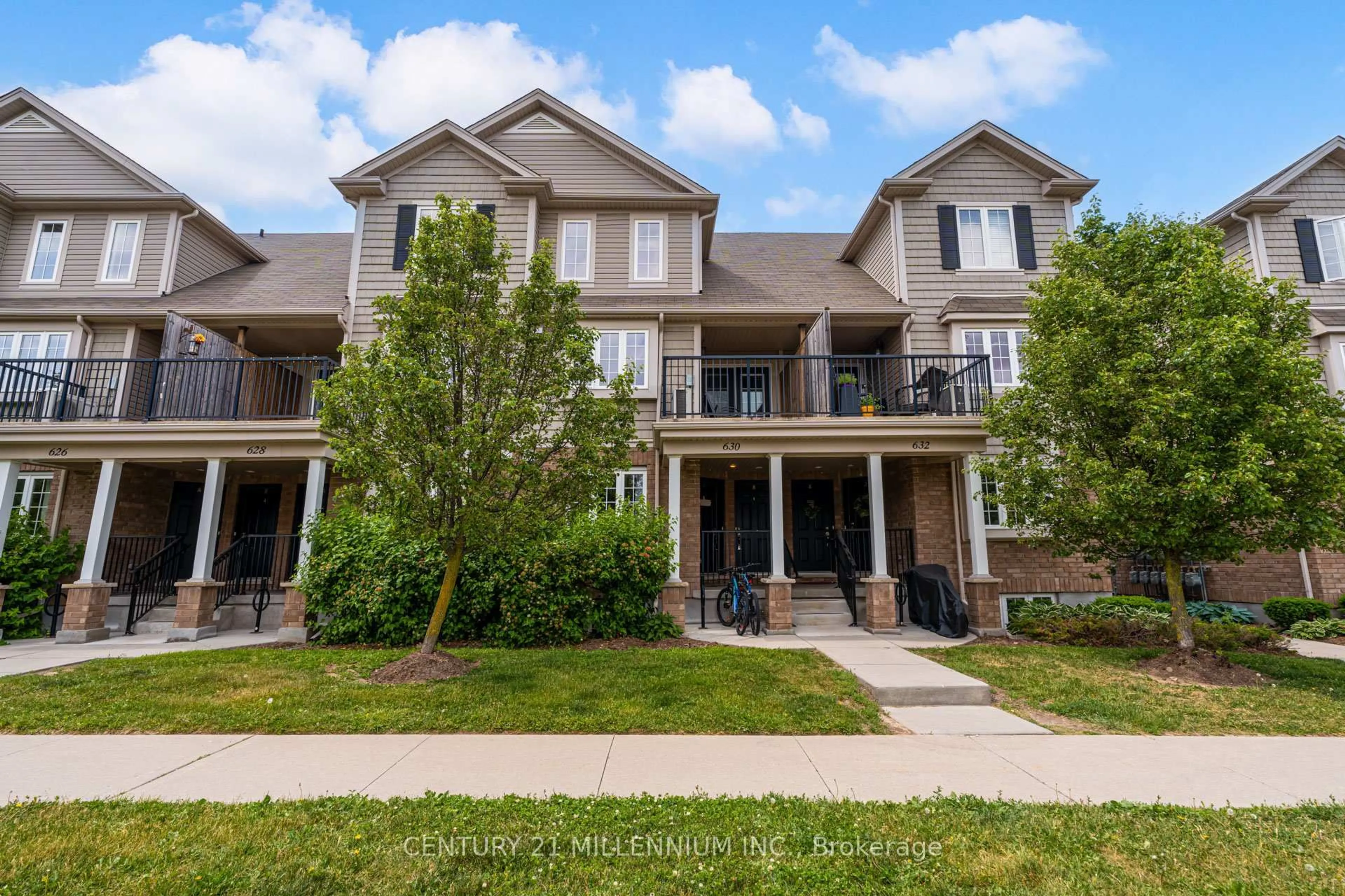 A pic from outside/outdoor area/front of a property/back of a property/a pic from drone, street for 630 Woodlawn Rd #A, Guelph Ontario N1E 0K4