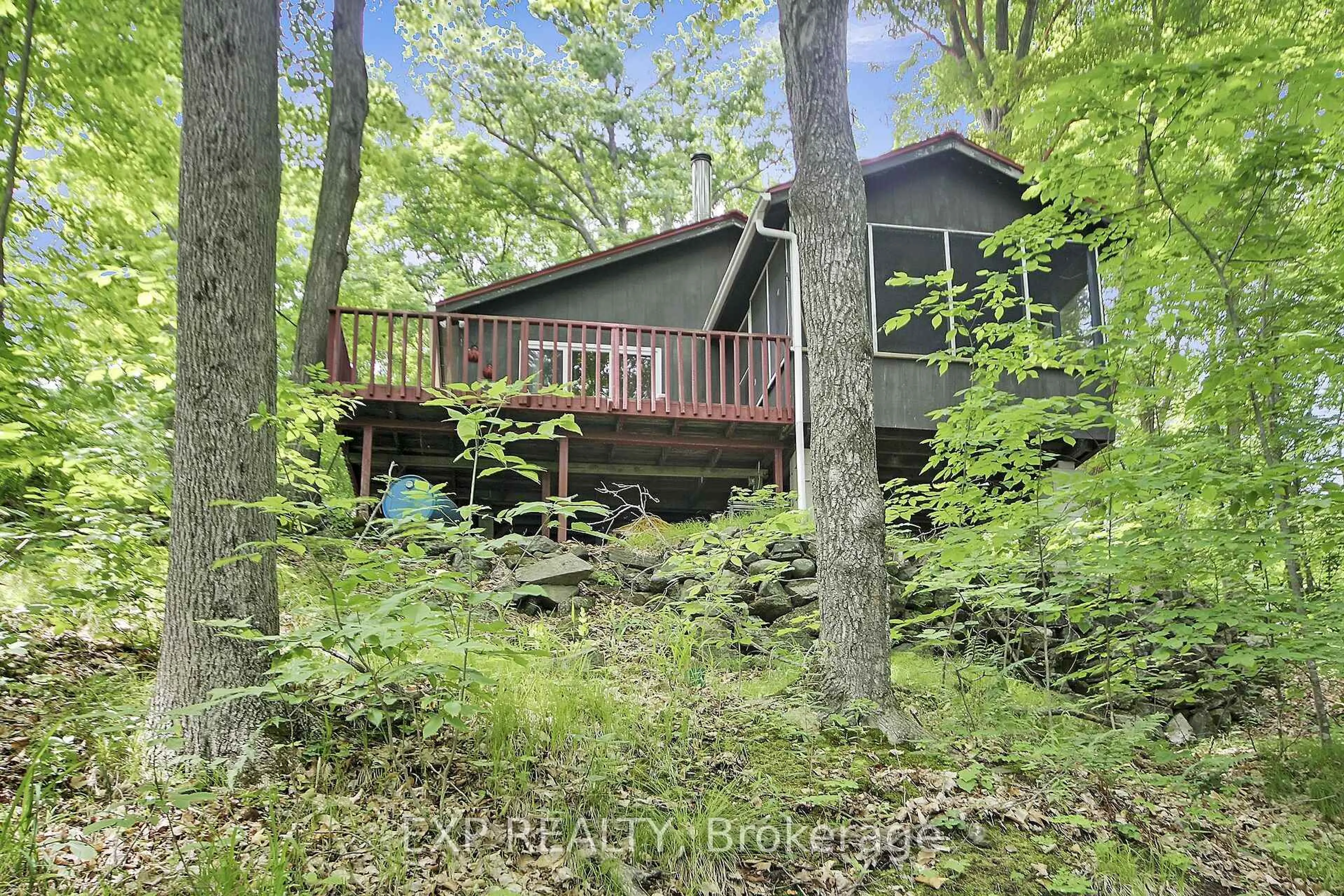 A pic from outside/outdoor area/front of a property/back of a property/a pic from drone, forest/trees view for 59 Fairhaven Lane, Maberly Ontario K0H 2B0