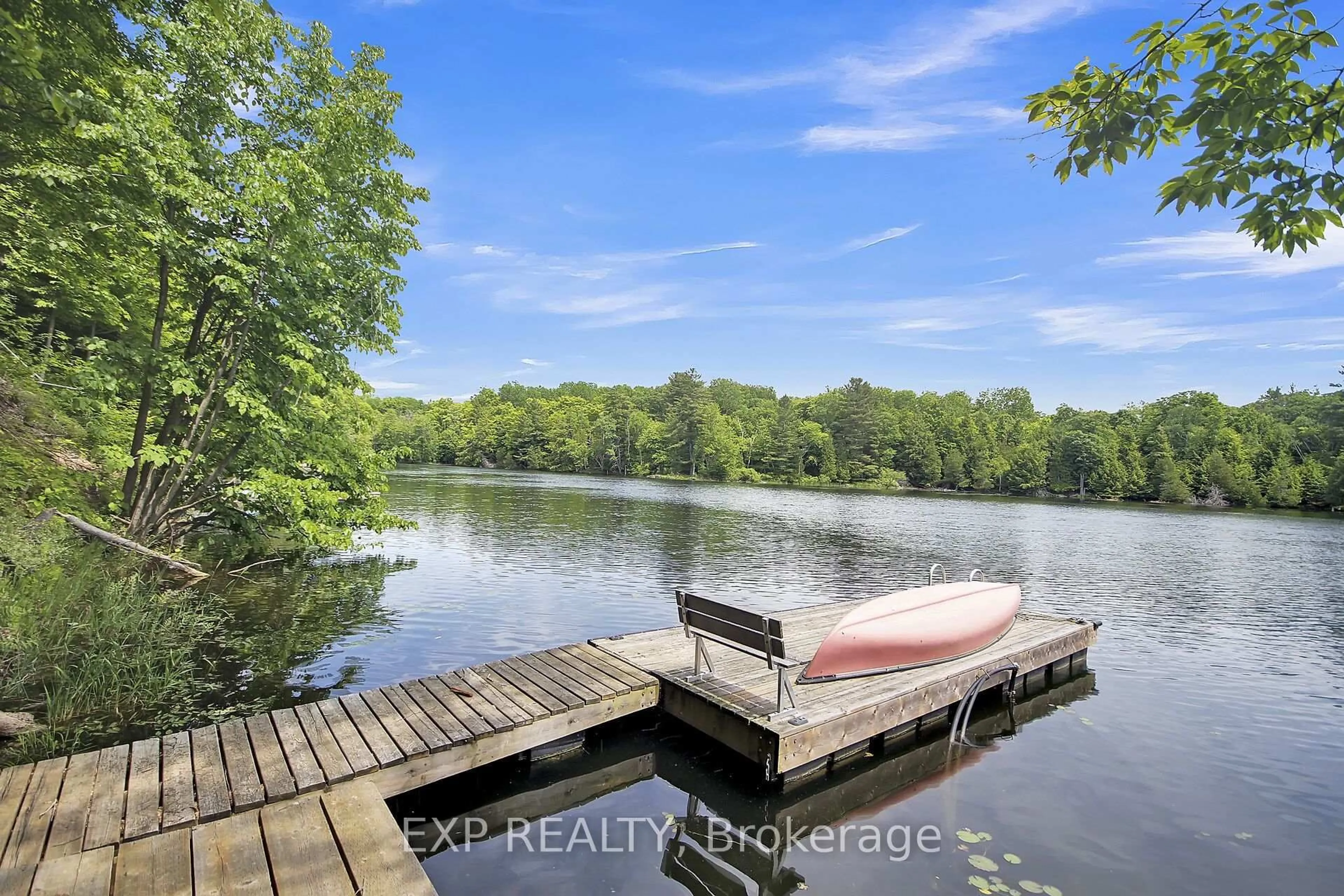 A pic from outside/outdoor area/front of a property/back of a property/a pic from drone, water/lake/river/ocean view for 59 Fairhaven Lane, Maberly Ontario K0H 2B0