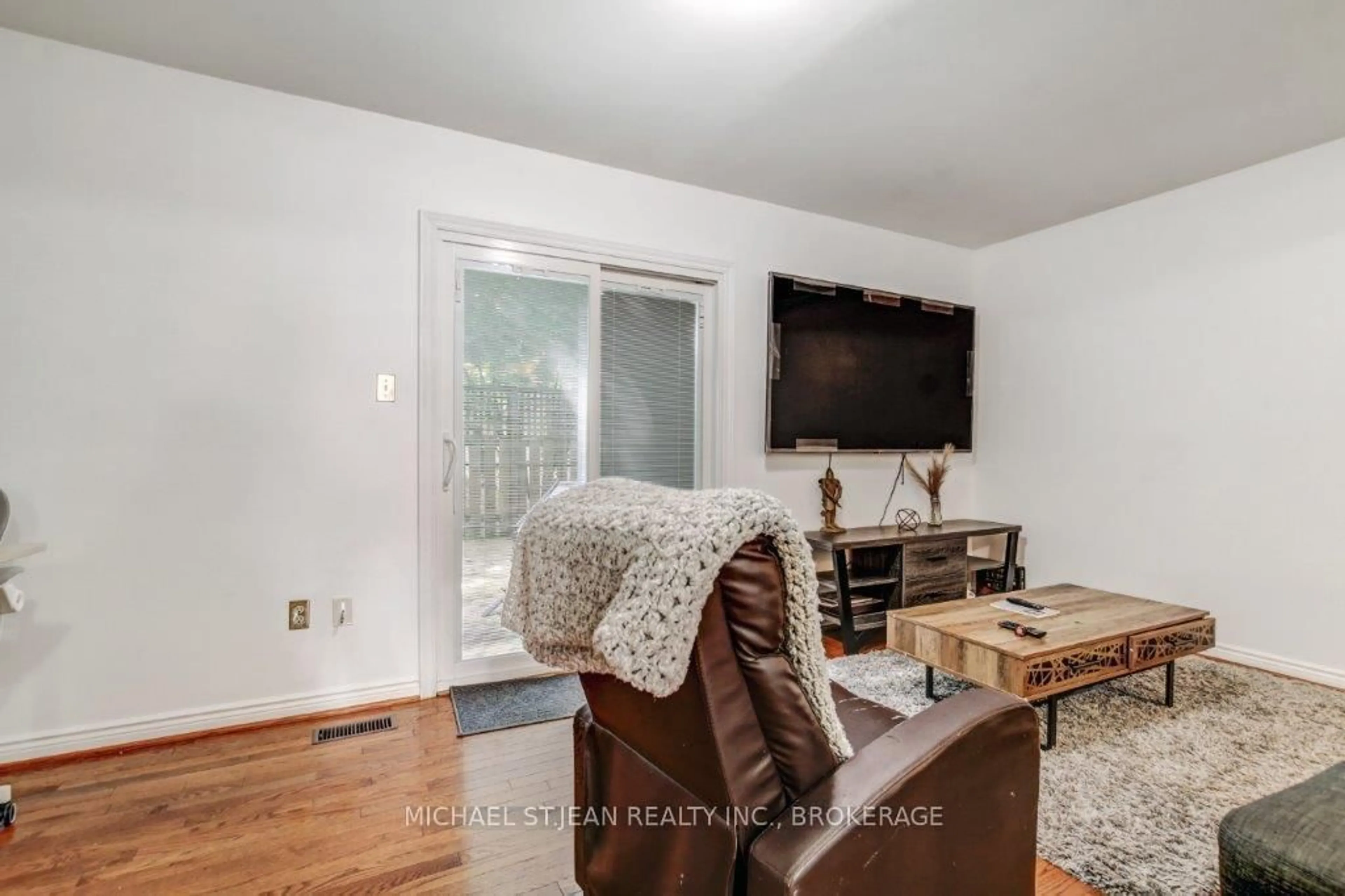 Living room with furniture, wood/laminate floor for 561 Princess Ave #2, London East Ontario N6B 2C1
