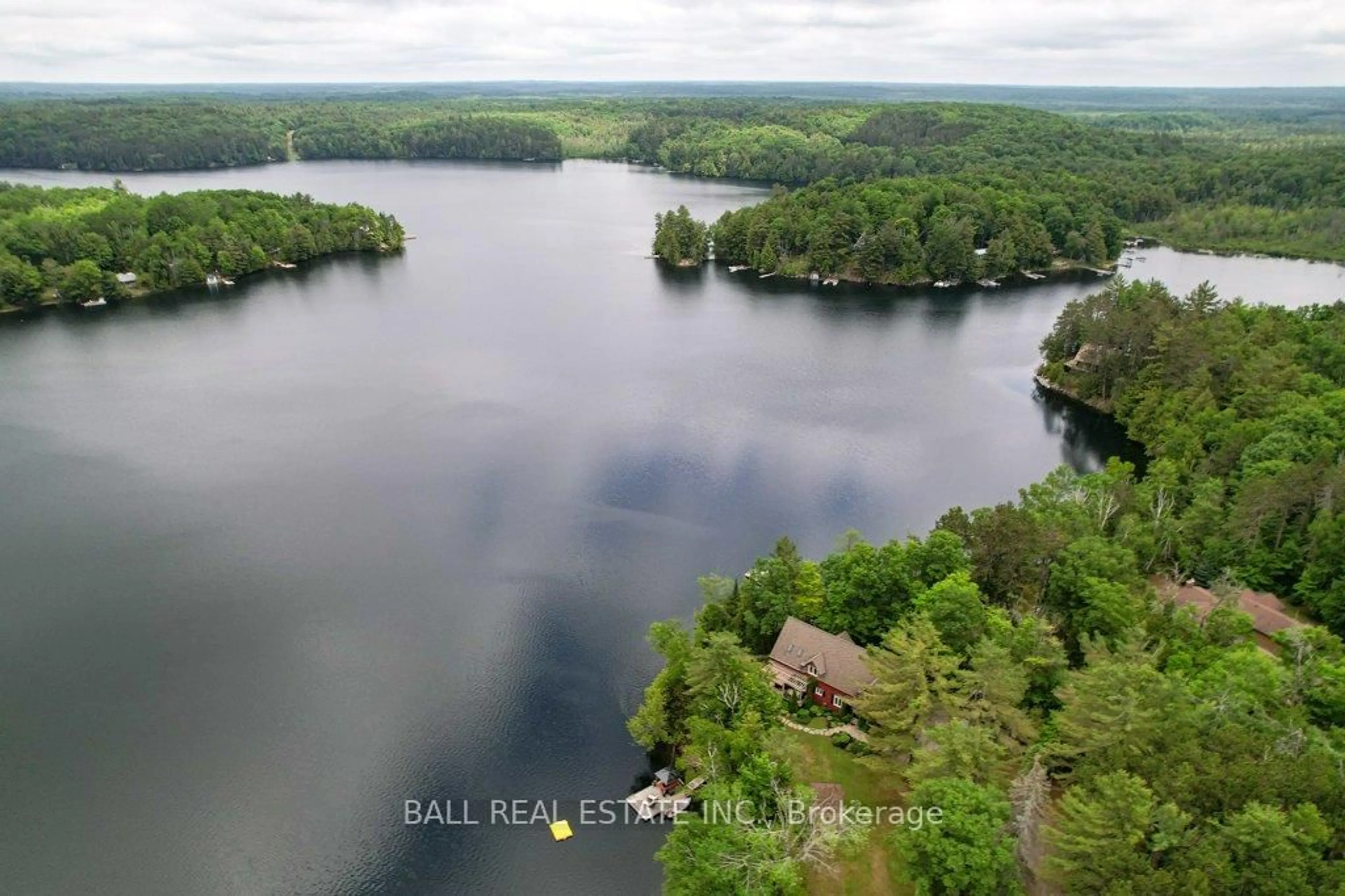 A pic from outside/outdoor area/front of a property/back of a property/a pic from drone, water/lake/river/ocean view for 32 Shadowood Lane, North Kawartha Ontario K0L 1A0