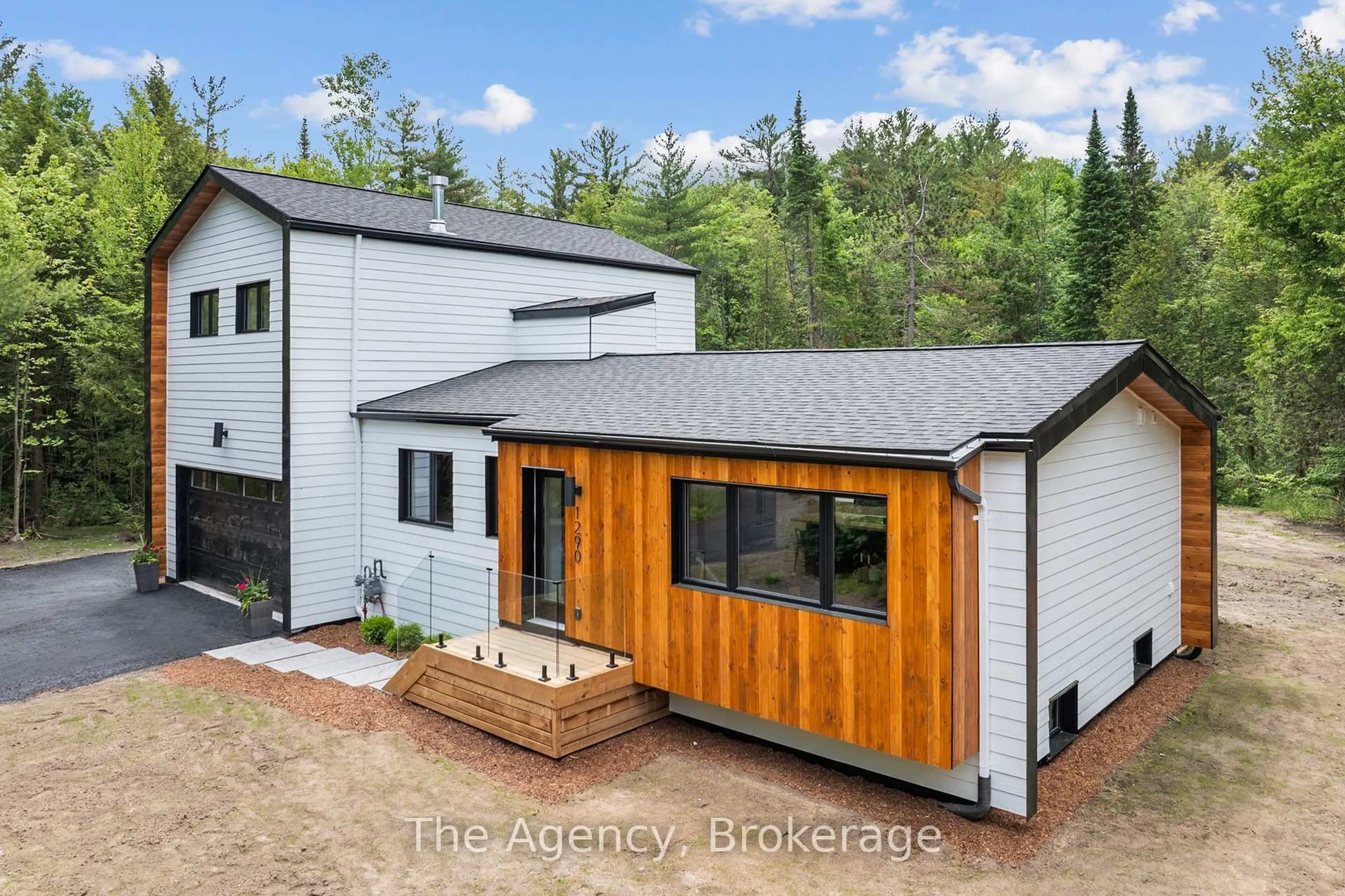 A pic from outside/outdoor area/front of a property/back of a property/a pic from drone, unknown for 1290 Cedar Lane, Bracebridge Ontario P1L 1W9