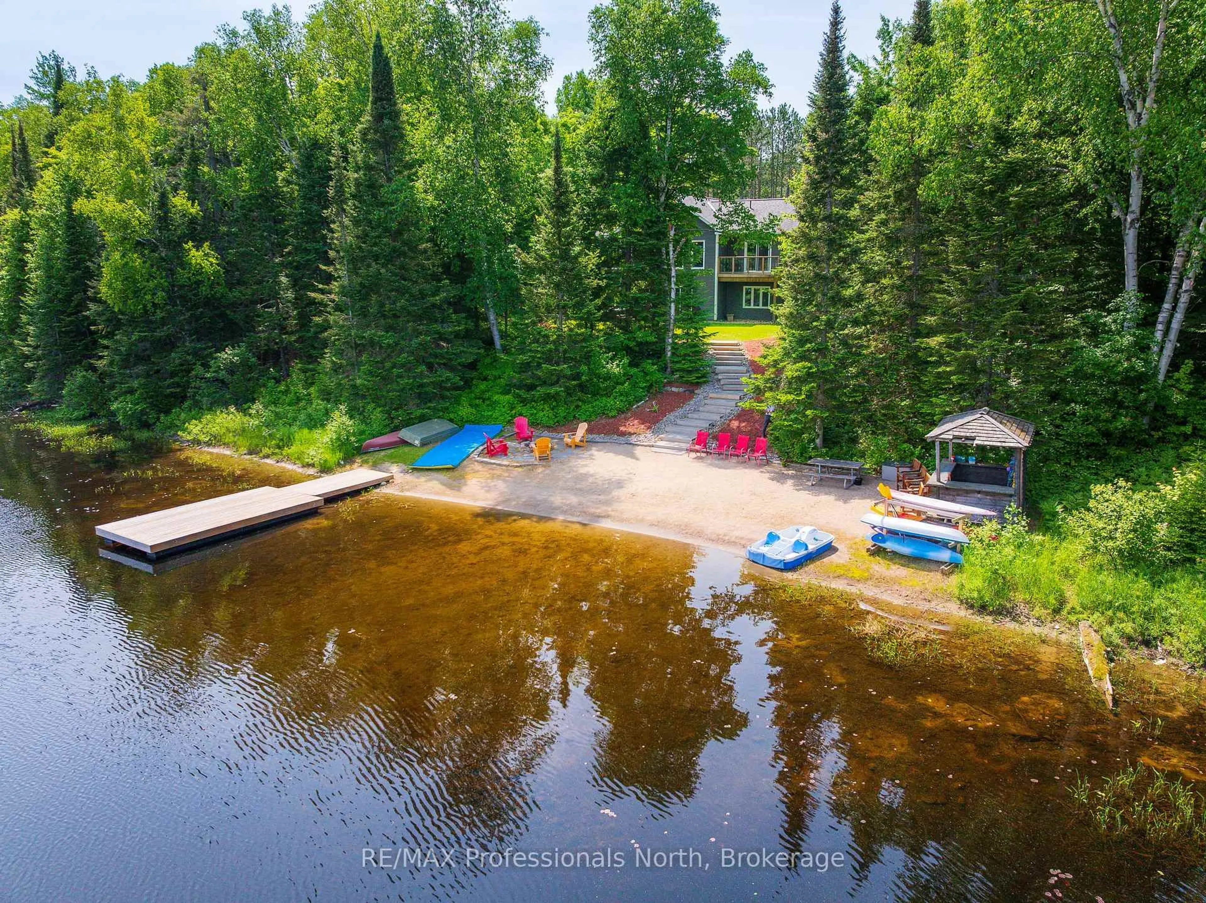 A pic from outside/outdoor area/front of a property/back of a property/a pic from drone, water/lake/river/ocean view for 579 Rochester Lake Rd, Perry Ontario P0A 1J0