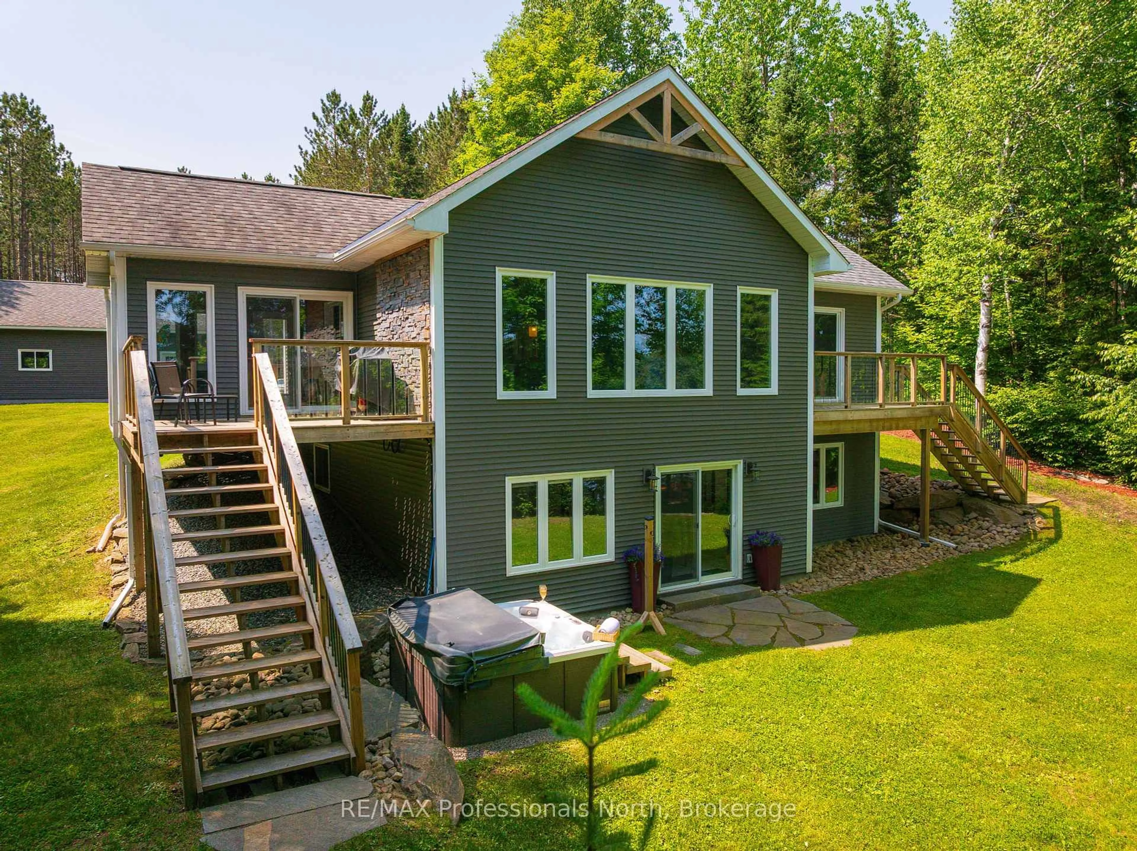 A pic from outside/outdoor area/front of a property/back of a property/a pic from drone, water/lake/river/ocean view for 579 Rochester Lake Rd, Perry Ontario P0A 1J0
