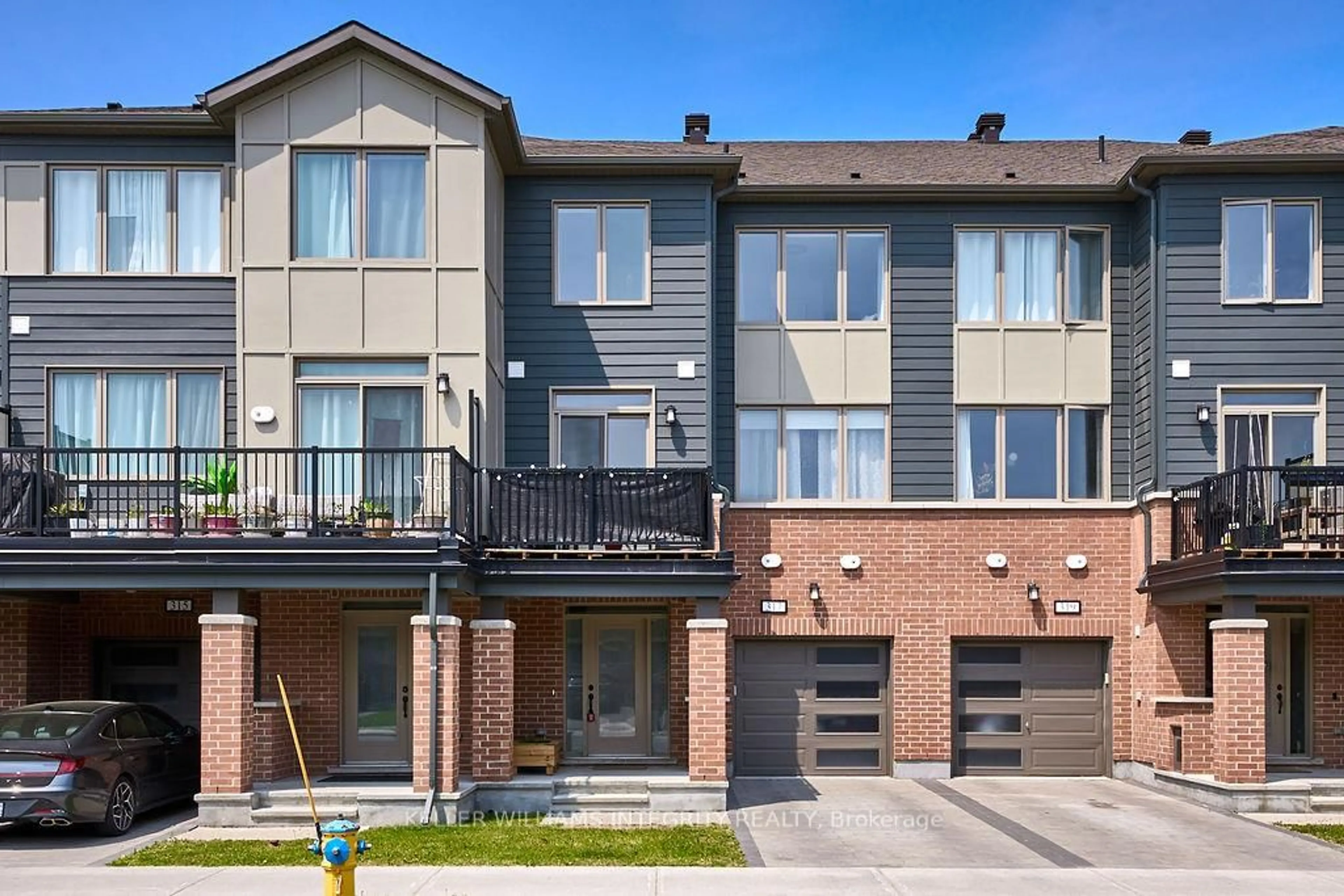 Home with brick exterior material, street for 317 Squadron Cres, Ottawa Ontario K1K 4Z4