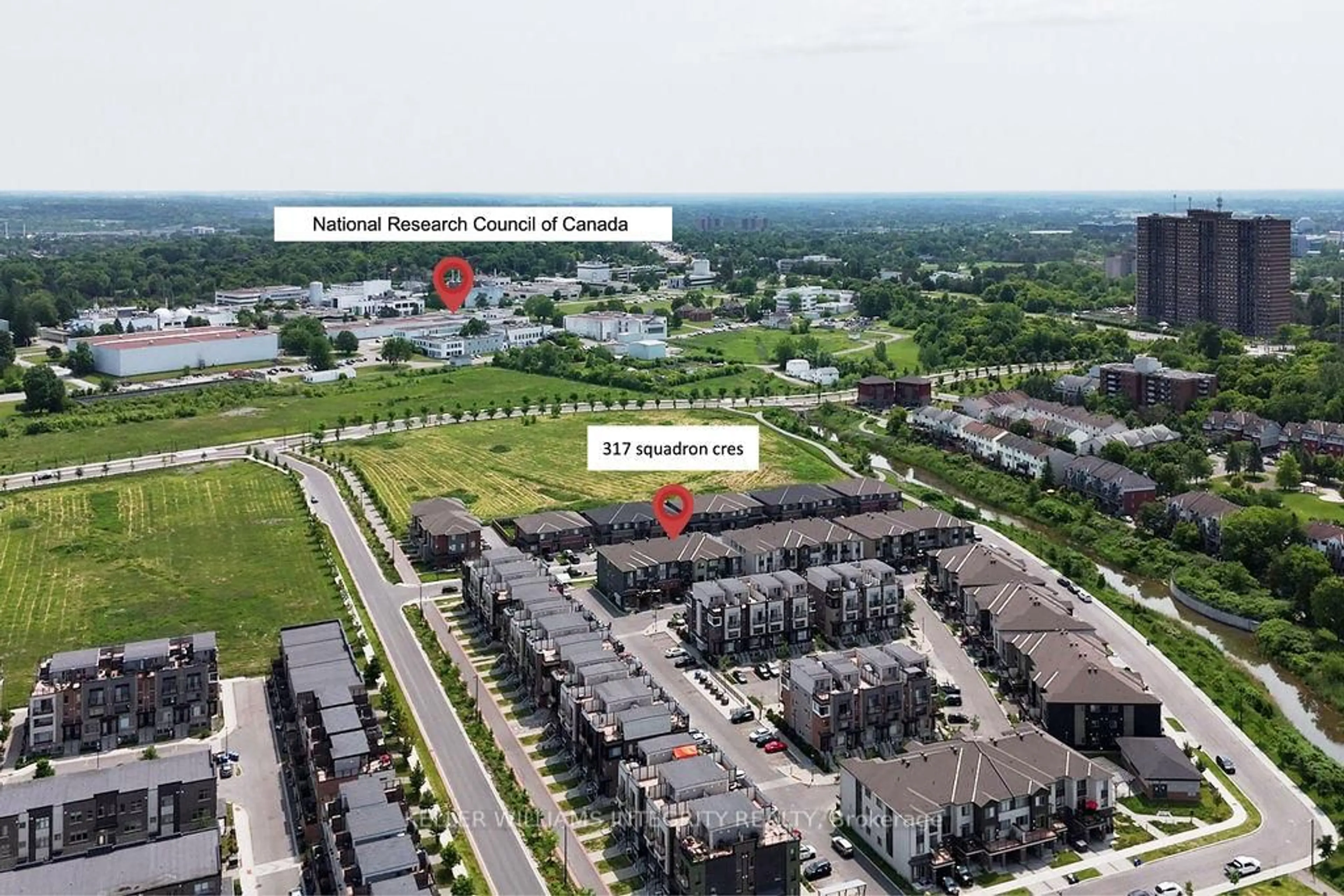 A pic from outside/outdoor area/front of a property/back of a property/a pic from drone, unknown for 317 Squadron Cres, Ottawa Ontario K1K 4Z4