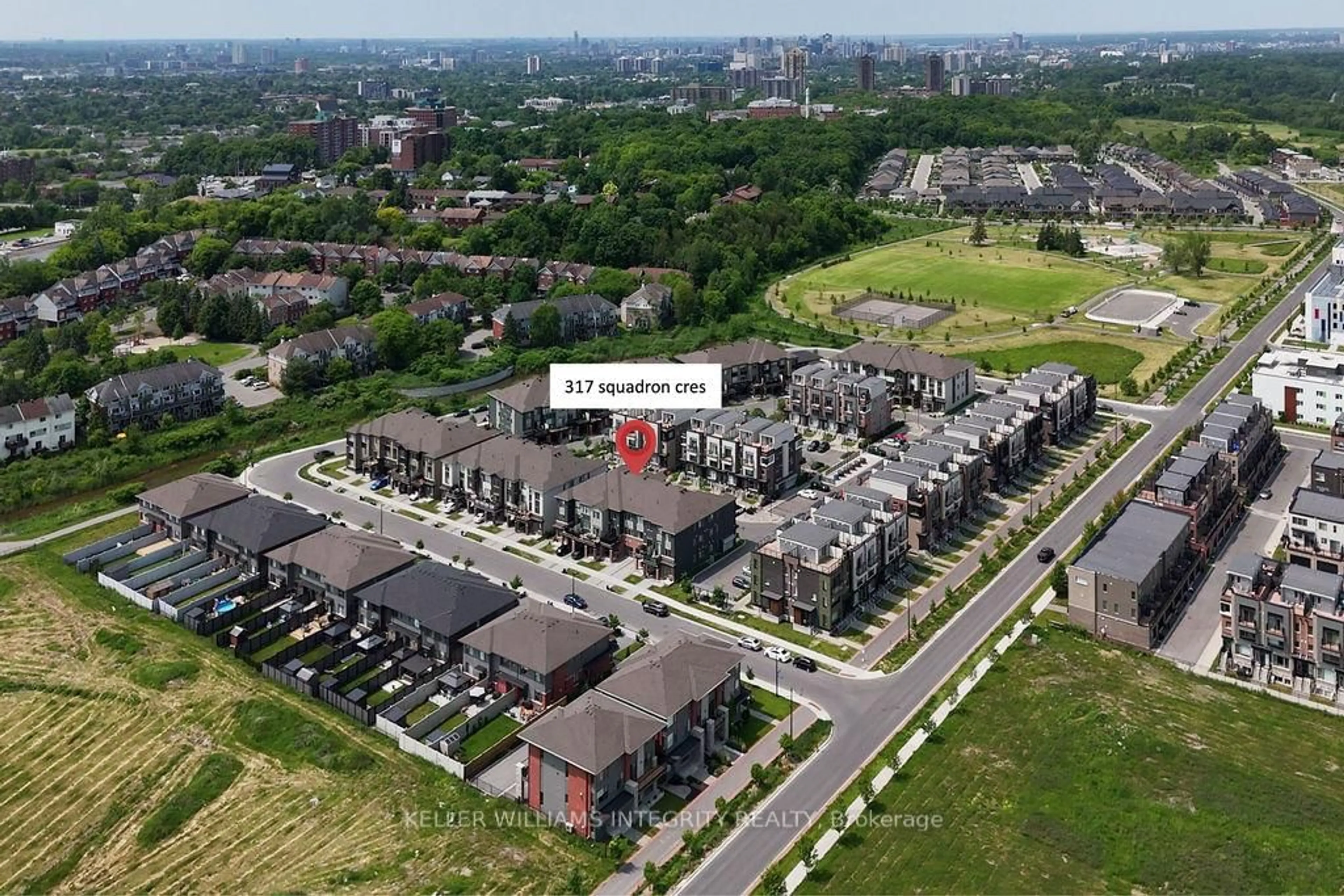 A pic from outside/outdoor area/front of a property/back of a property/a pic from drone, city buildings view from balcony for 317 Squadron Cres, Ottawa Ontario K1K 4Z4