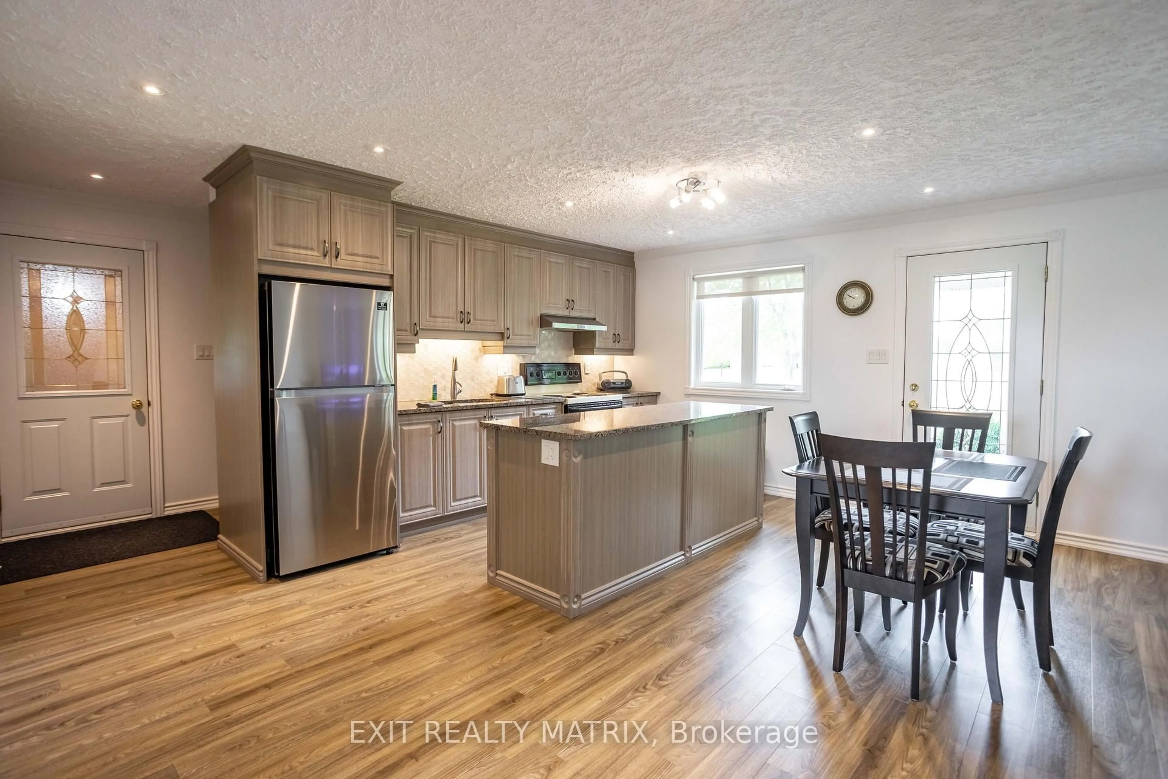 Open concept kitchen, wood/laminate floor for 4145 Champlain St, Clarence-Rockland Ontario K0A 1E0