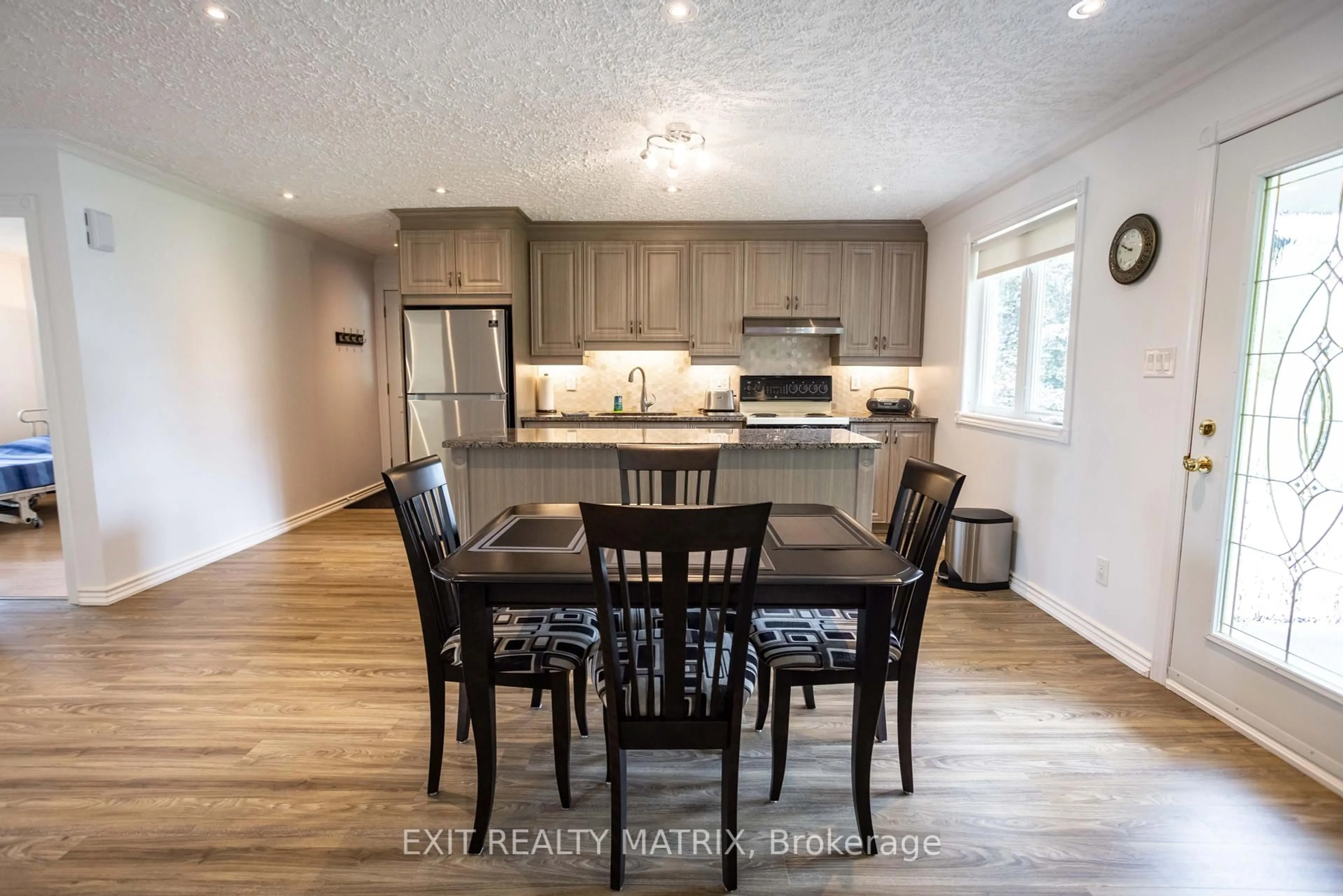Open concept kitchen, wood/laminate floor for 4145 Champlain St, Clarence-Rockland Ontario K0A 1E0