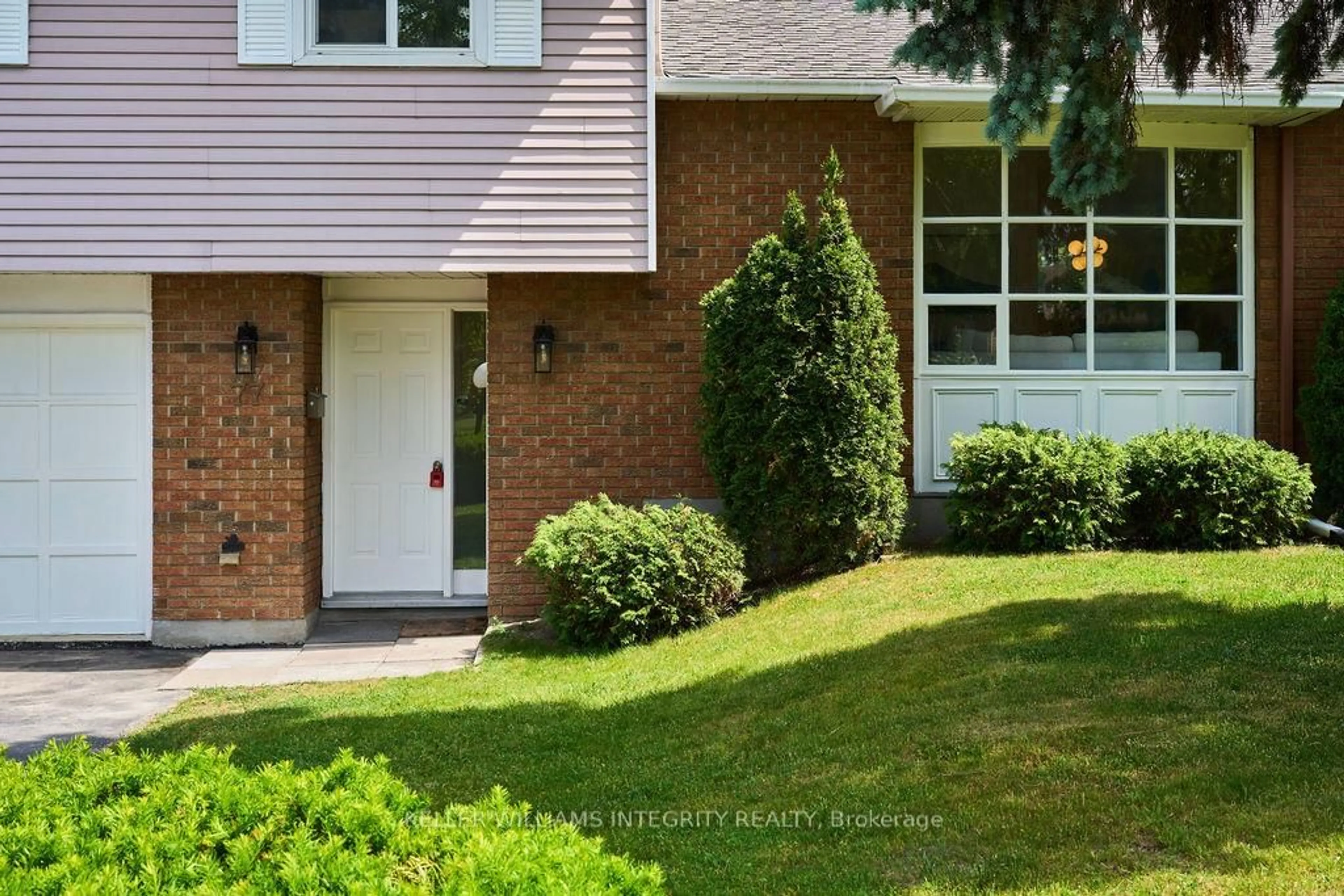 Home with brick exterior material, street for 77 Seabrooke Dr, Ottawa Ontario K2L 2K4