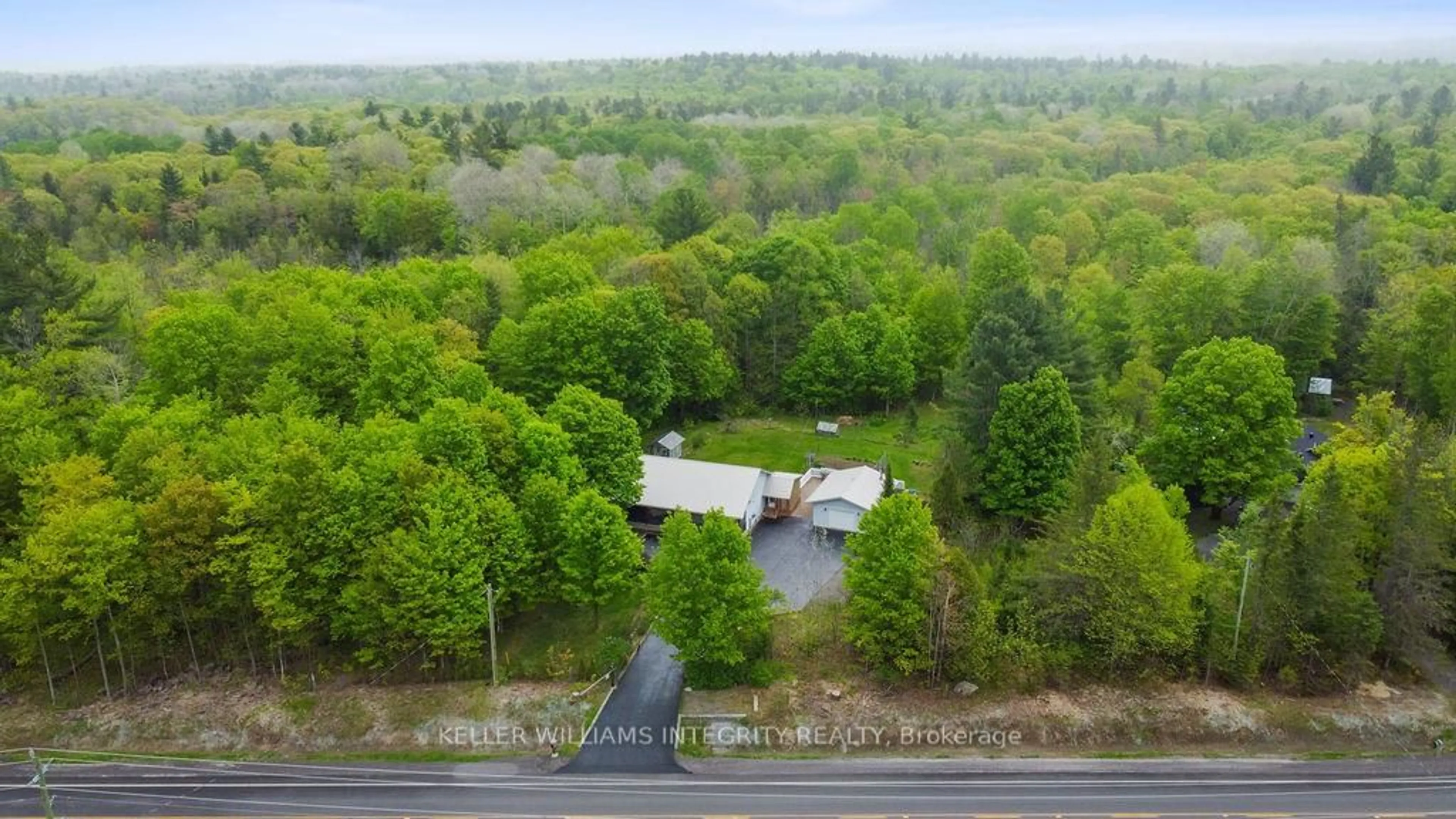 A pic from outside/outdoor area/front of a property/back of a property/a pic from drone, forest/trees view for 1179 Calabogie Rd, Renfrew Ontario K7V 3Z4
