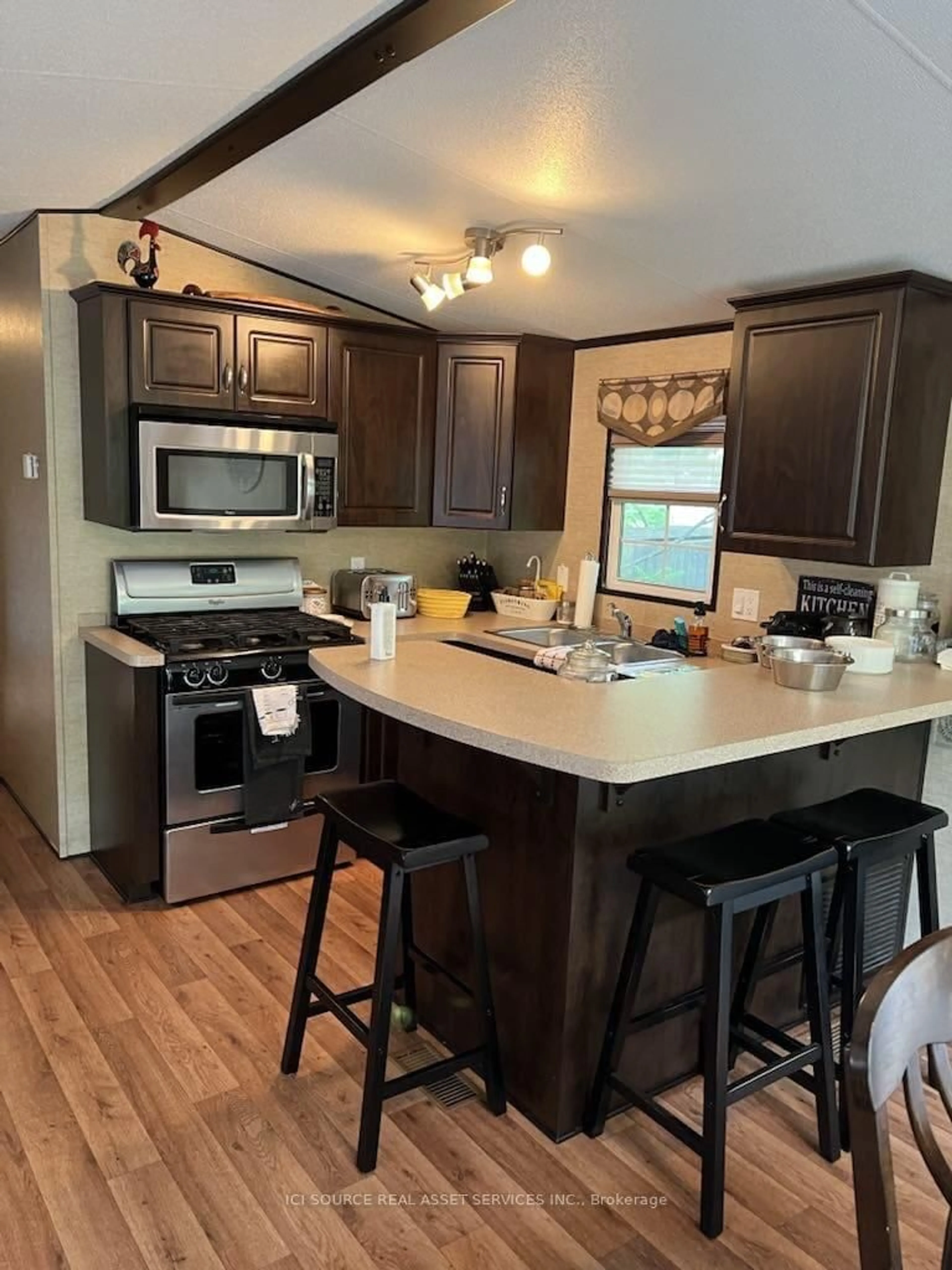 Open concept kitchen, wood/laminate floor for 1336 S Morrison Lake Rd #MOR005, Gravenhurst Ontario P0E 1G0
