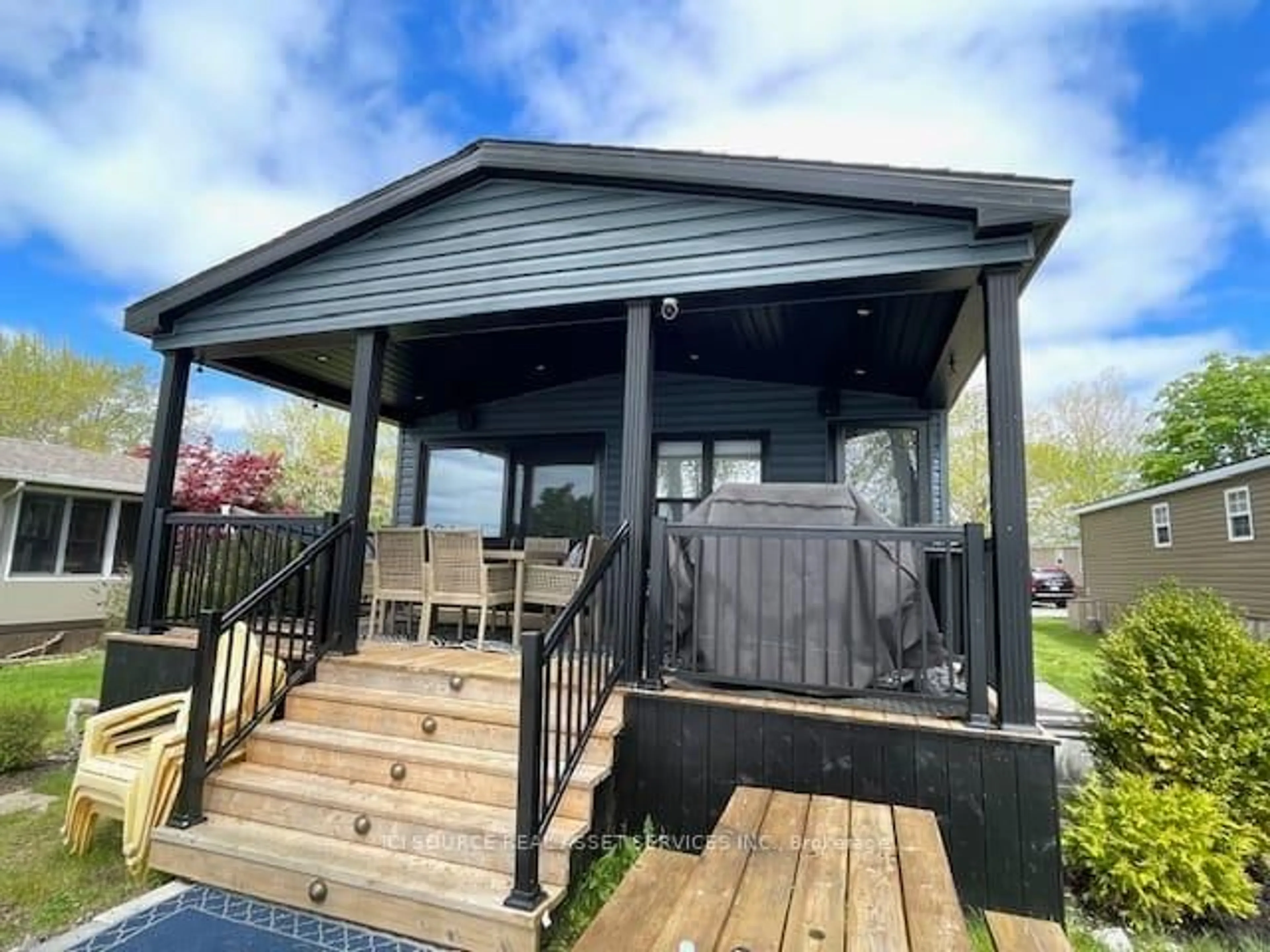Home with vinyl exterior material, water/lake/river/ocean view for 486 County Rd 18 #CBL087, Prince Edward County Ontario K0K 1P0