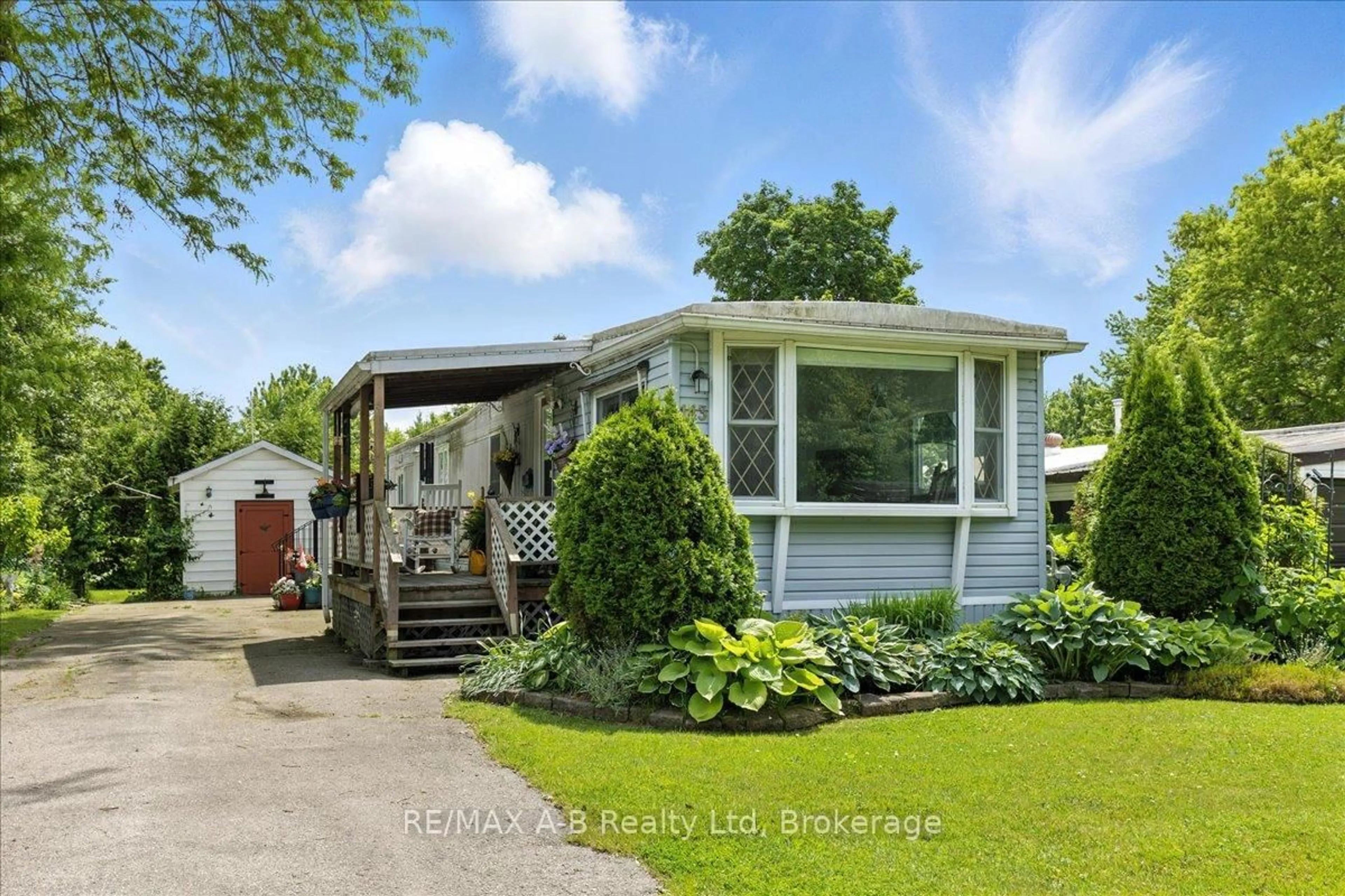 Home with vinyl exterior material, street for 143 Ash St #Crystal Lake, Perth East Ontario N5A 6S6