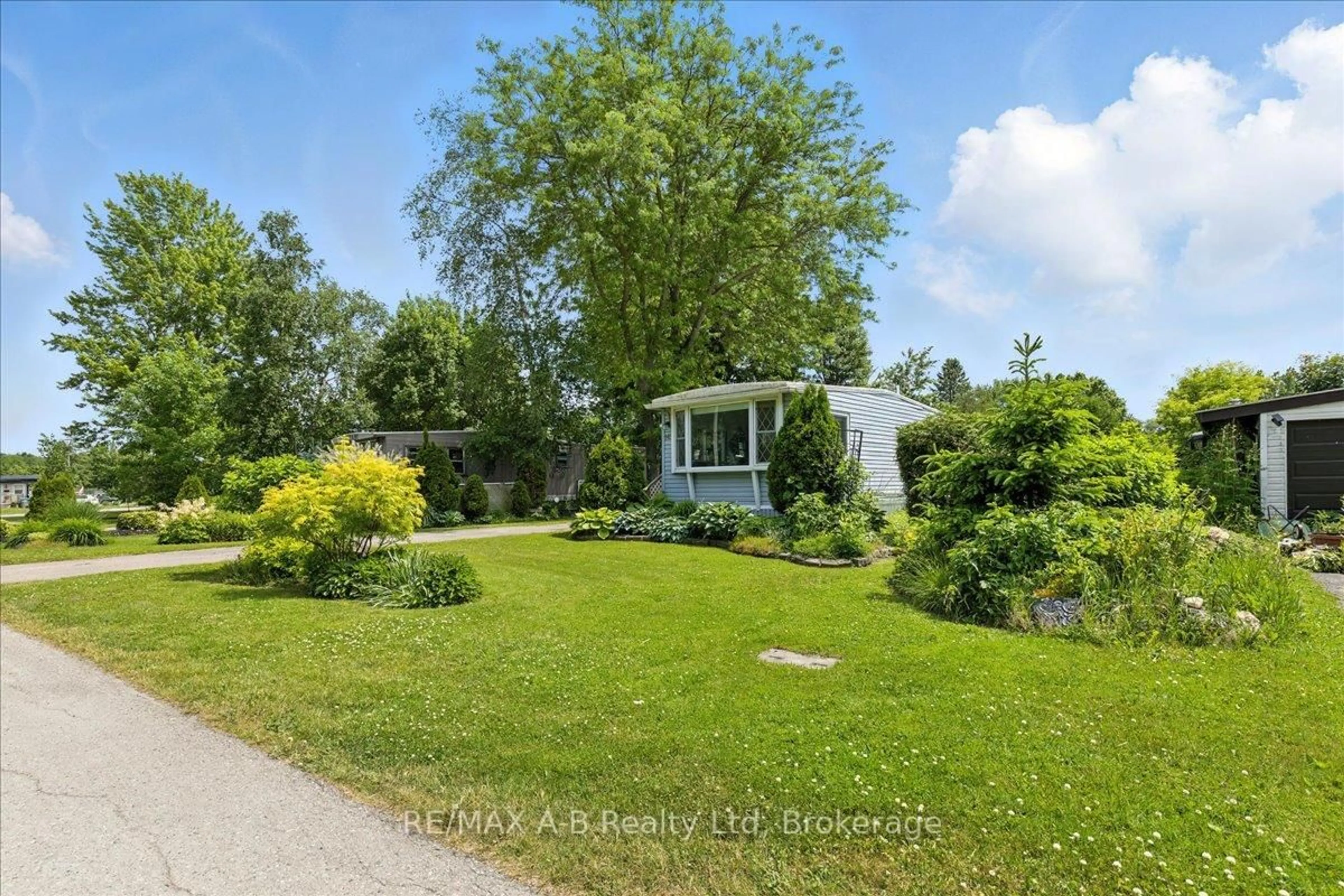 A pic from outside/outdoor area/front of a property/back of a property/a pic from drone, unknown for 143 Ash St #Crystal Lake, Perth East Ontario N5A 6S6