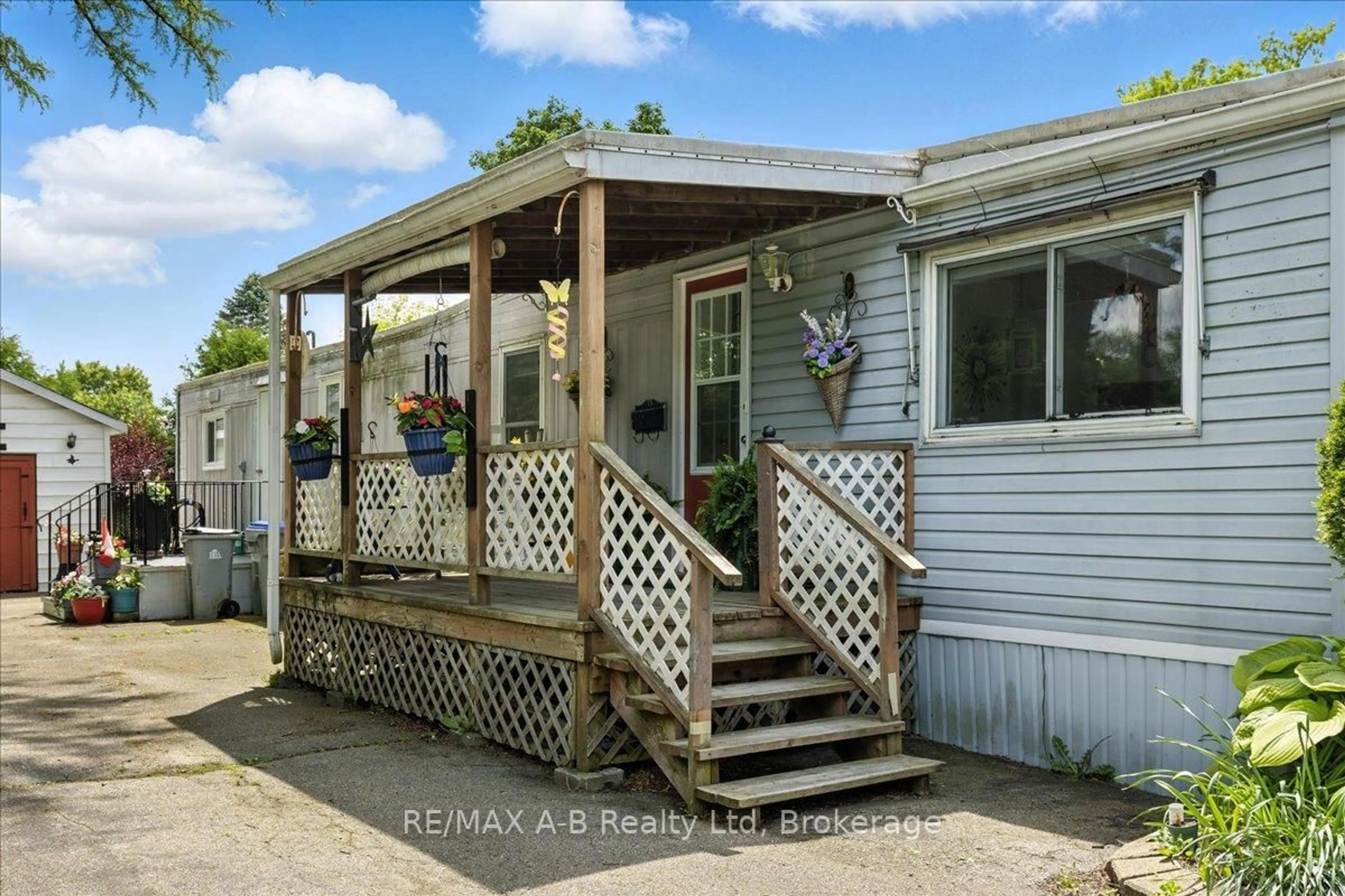 Home with vinyl exterior material, street for 143 Ash St #Crystal Lake, Perth East Ontario N5A 6S6