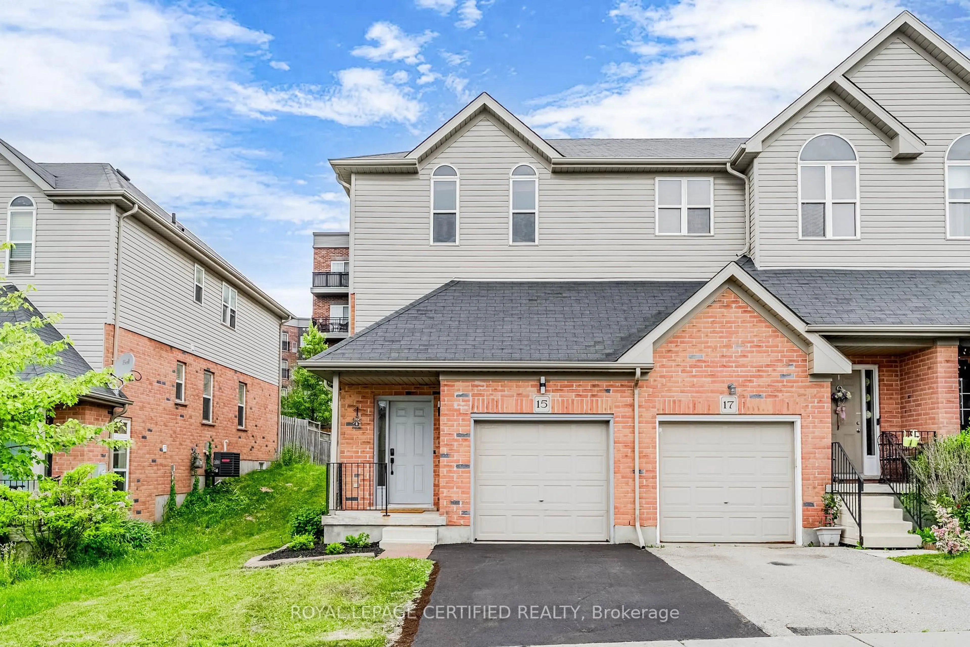 Home with brick exterior material, street for 15 Brookfield Cres, Kitchener Ontario N2E 0A6