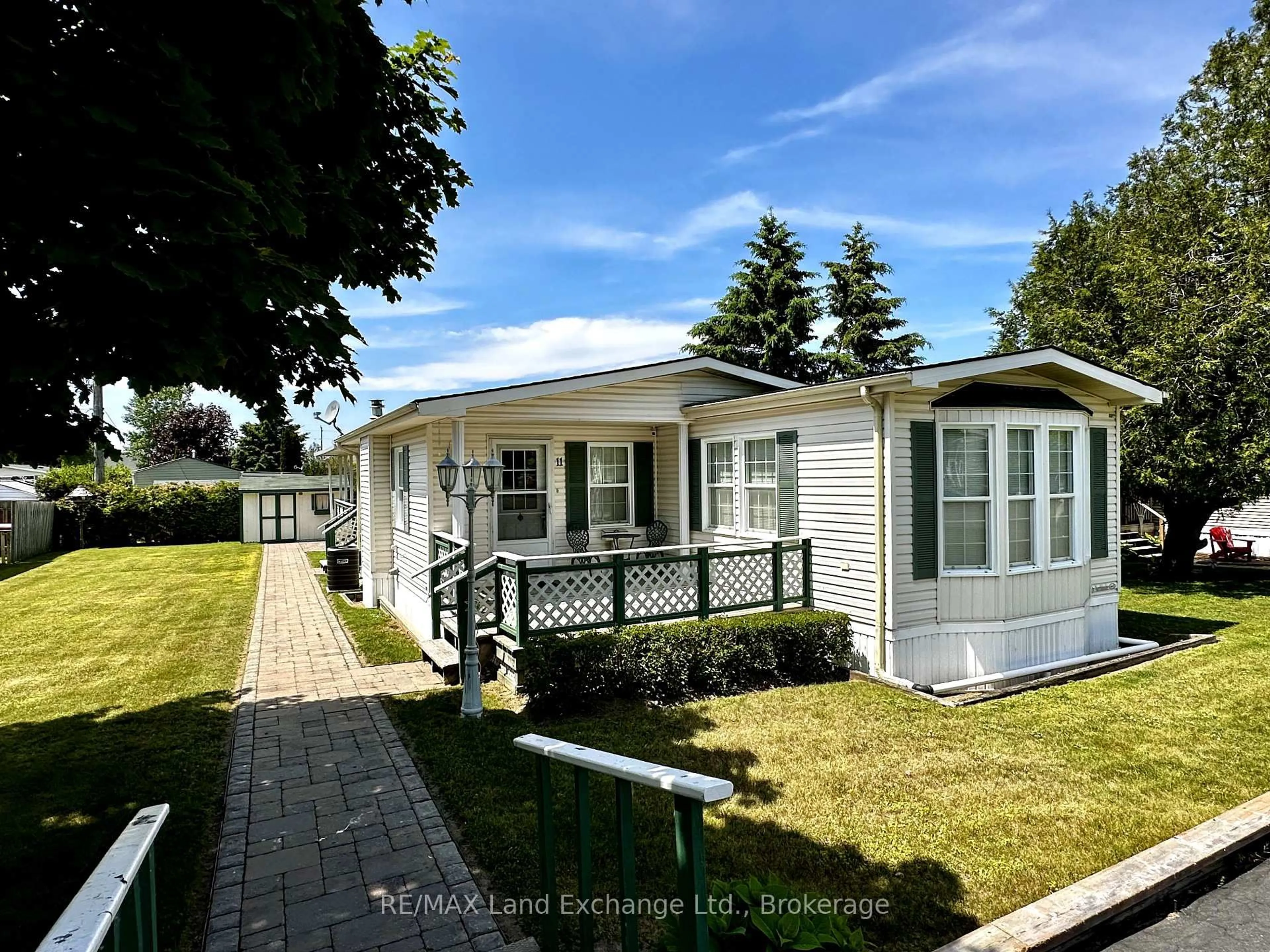 Home with vinyl exterior material, street for 332 Concession 6 Rd #11, Saugeen Shores Ontario N0H 2C7