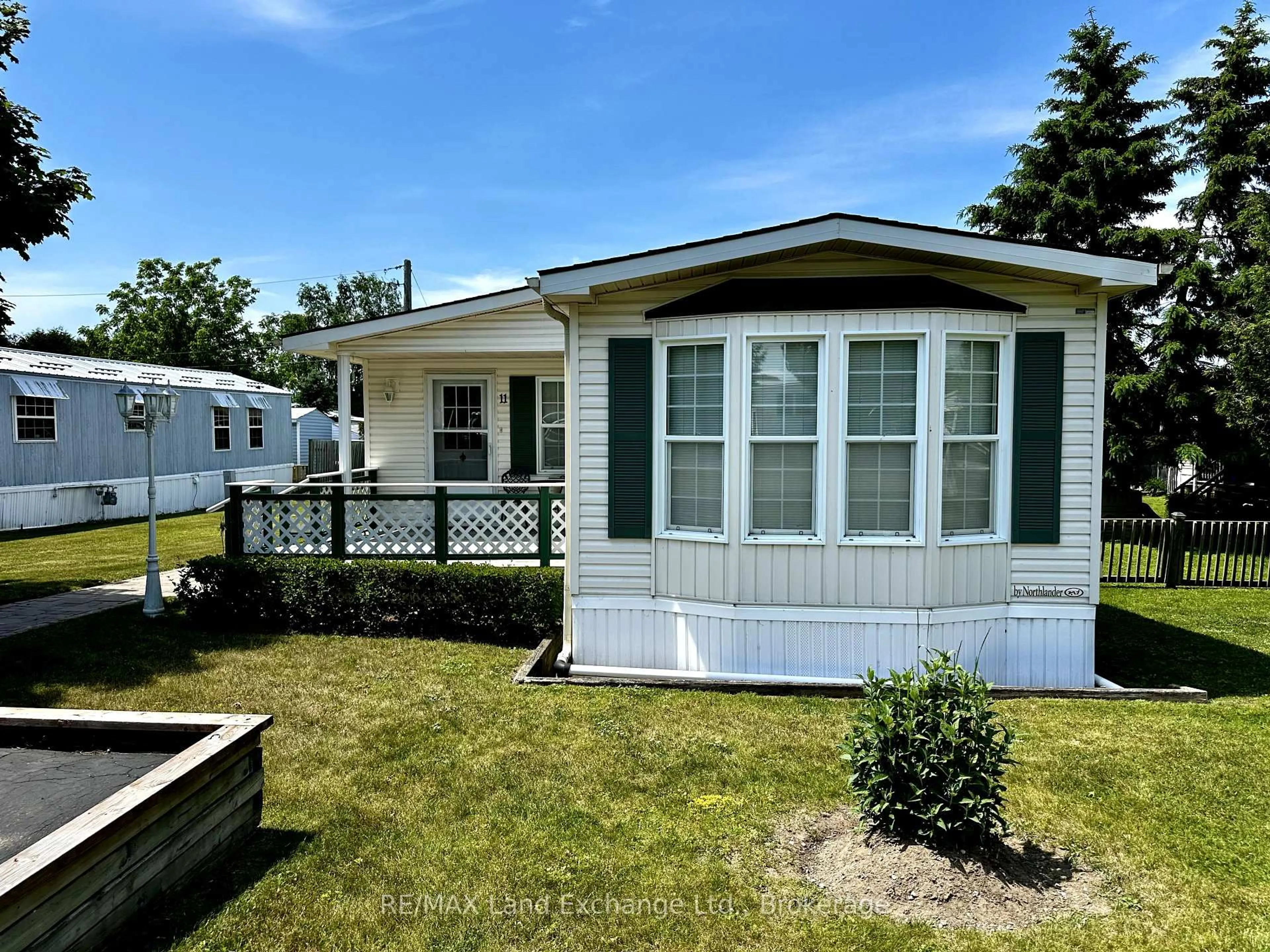 Home with vinyl exterior material, street for 332 Concession 6 Rd #11, Saugeen Shores Ontario N0H 2C7