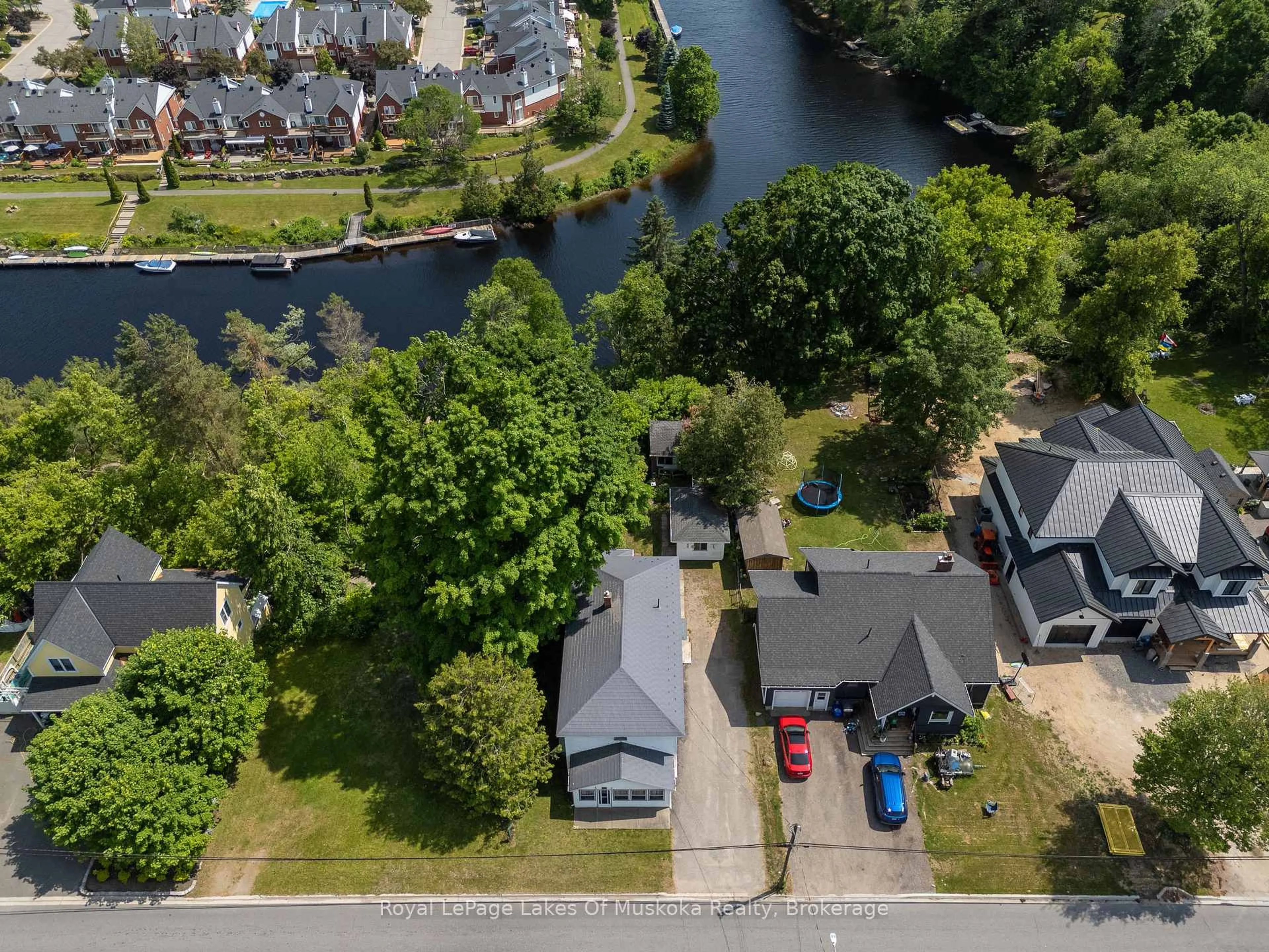 A pic from outside/outdoor area/front of a property/back of a property/a pic from drone, water/lake/river/ocean view for 156 Dill St, Bracebridge Ontario P1L 1E5