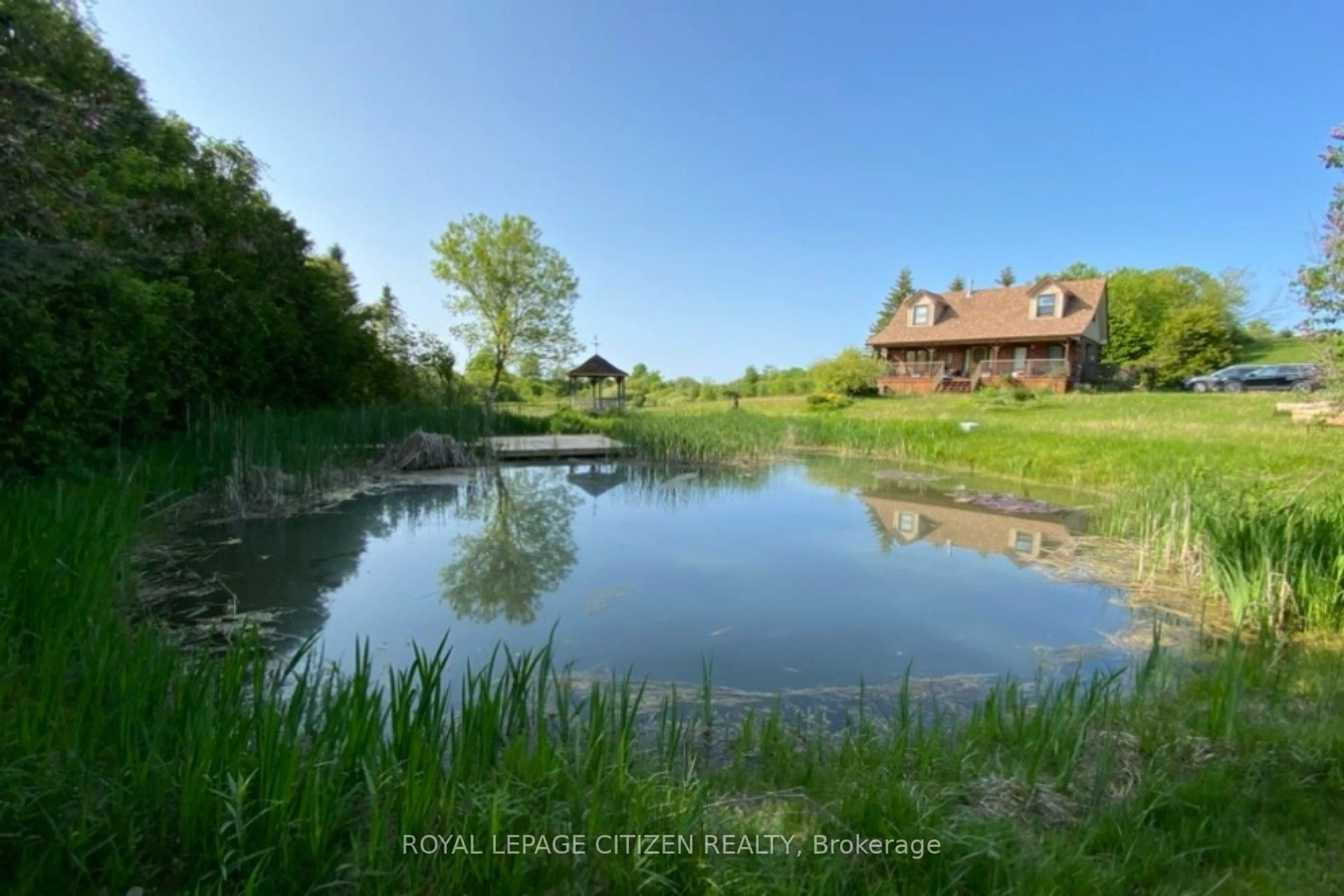 A pic from outside/outdoor area/front of a property/back of a property/a pic from drone, water/lake/river/ocean view for 713 Cottingham Rd, Kawartha Lakes Ontario K0L 2W0