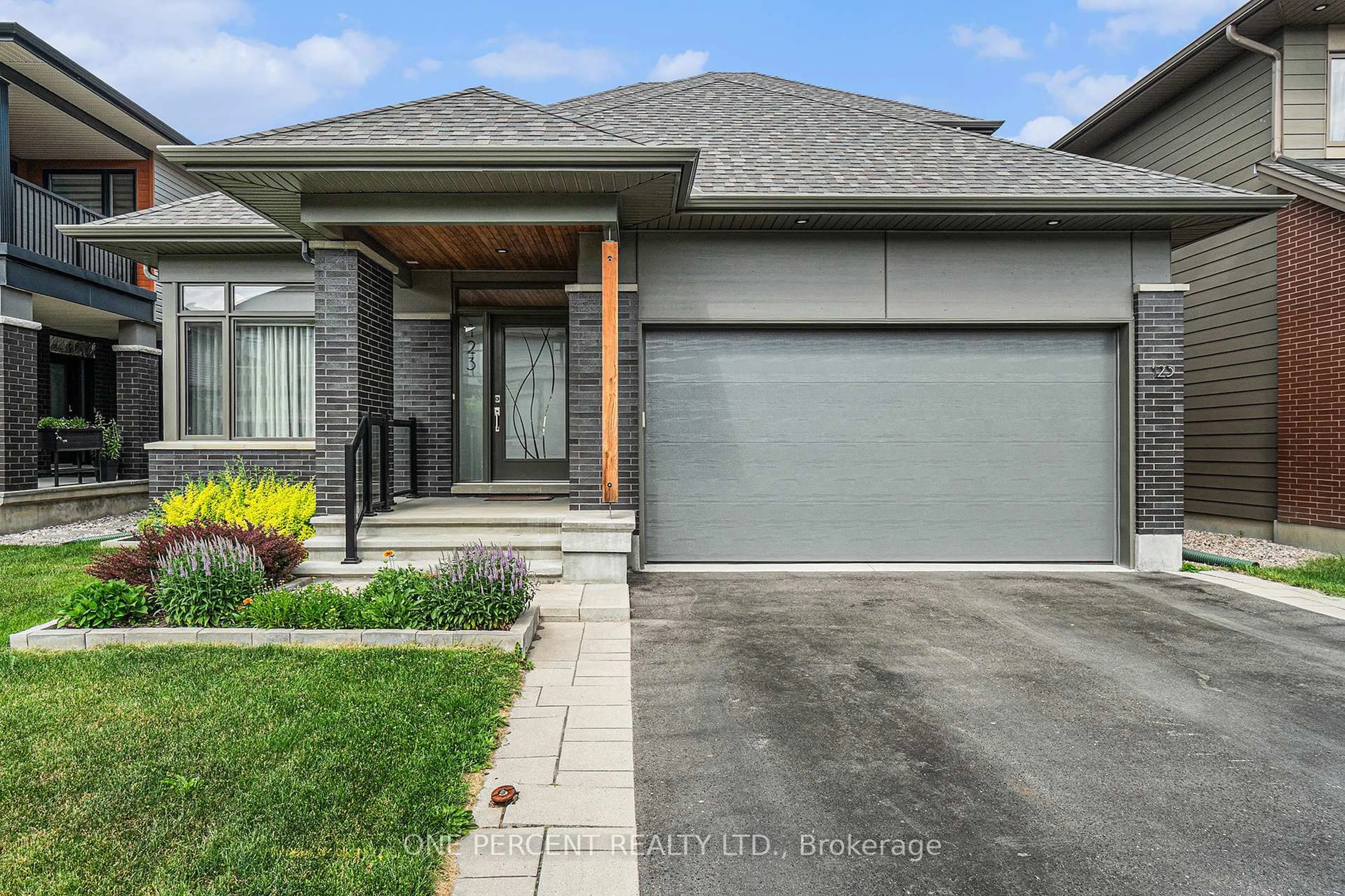 Home with brick exterior material, street for 123 Pathfinder Way, Ottawa Ontario K1X 0C9