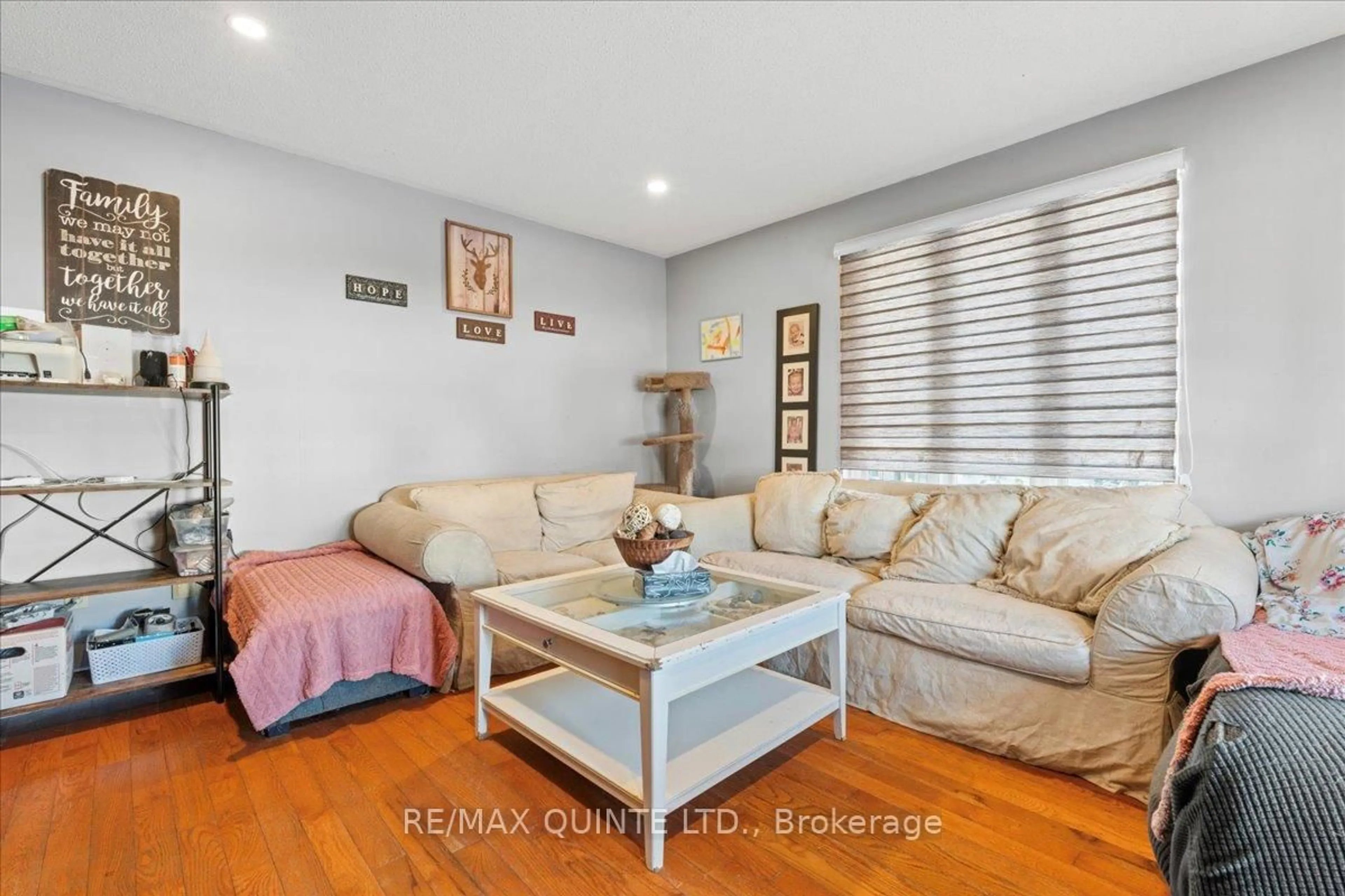 Living room with furniture, wood/laminate floor for 13 Colborne St, Madoc Ontario K0K 2K0