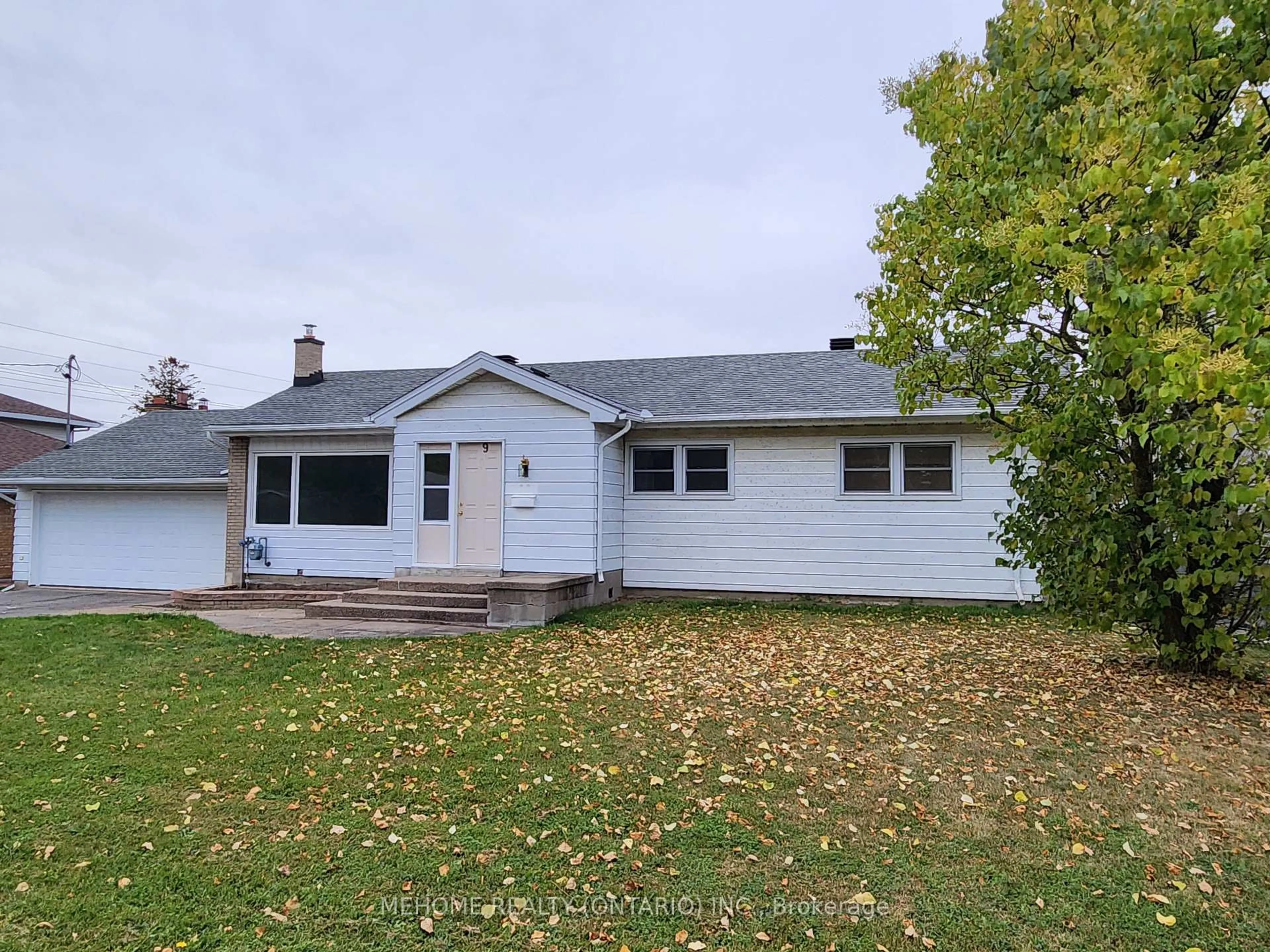Home with vinyl exterior material, street for 9 Epworth Ave, Ottawa Ontario K2G 2L4