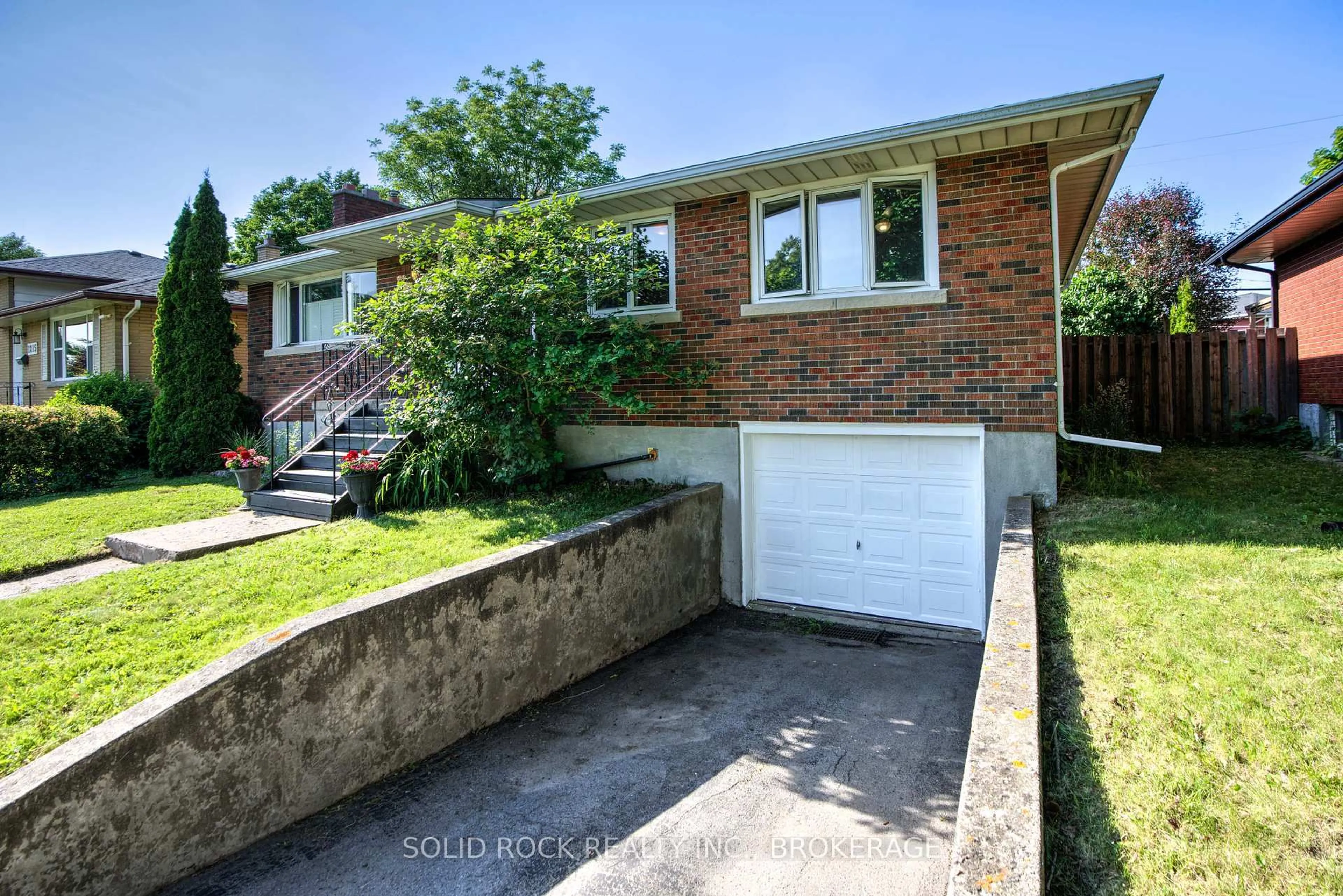 Home with brick exterior material, street for 1209 Johnson St, Kingston Ontario K7M 2P1