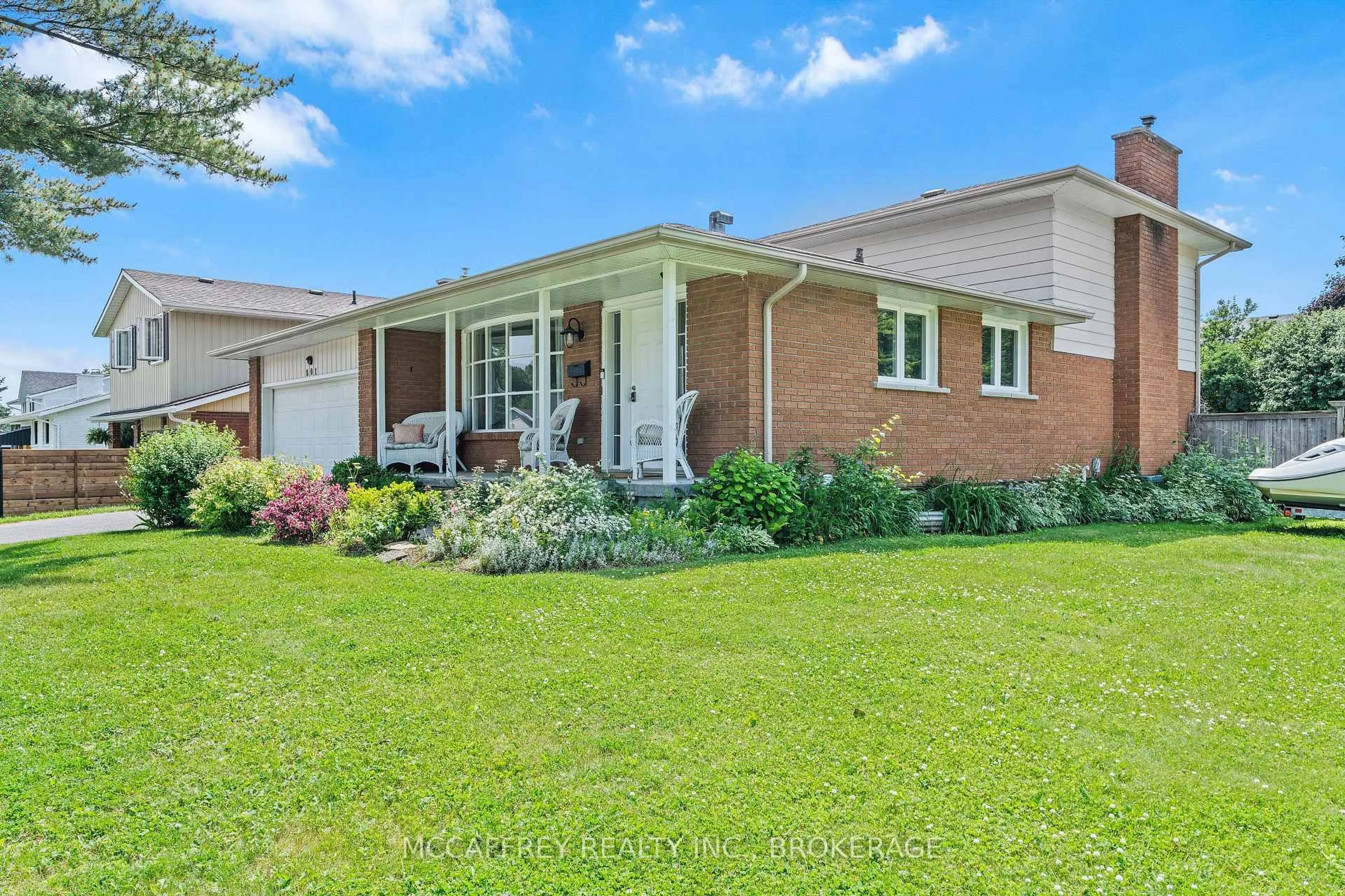 Home with brick exterior material, street for 801 High Gate Park Dr, Kingston Ontario K7M 5Z5