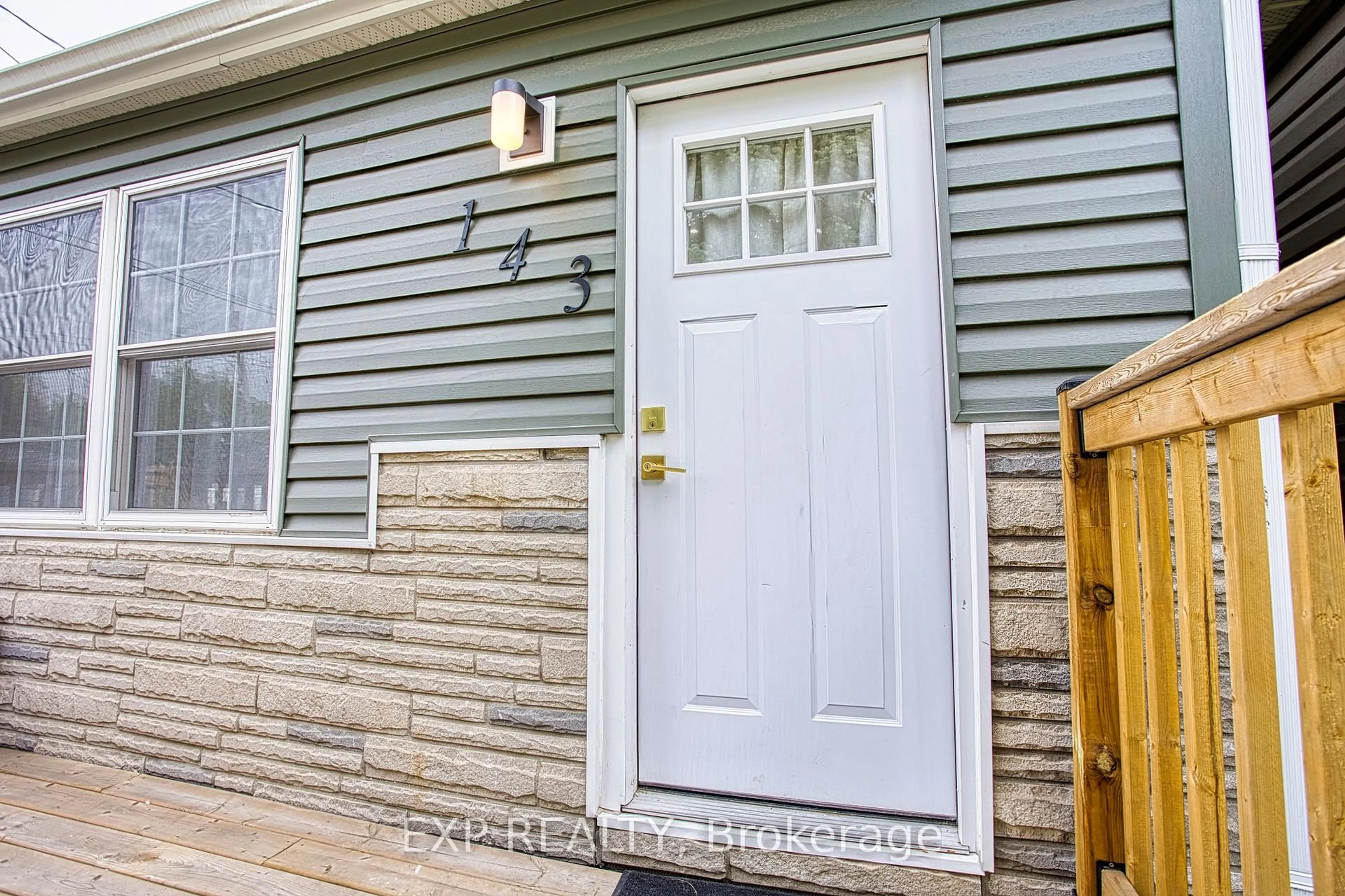 Home with vinyl exterior material, street for 143 McAnulty Blvd, Hamilton Ontario L8H 3H6