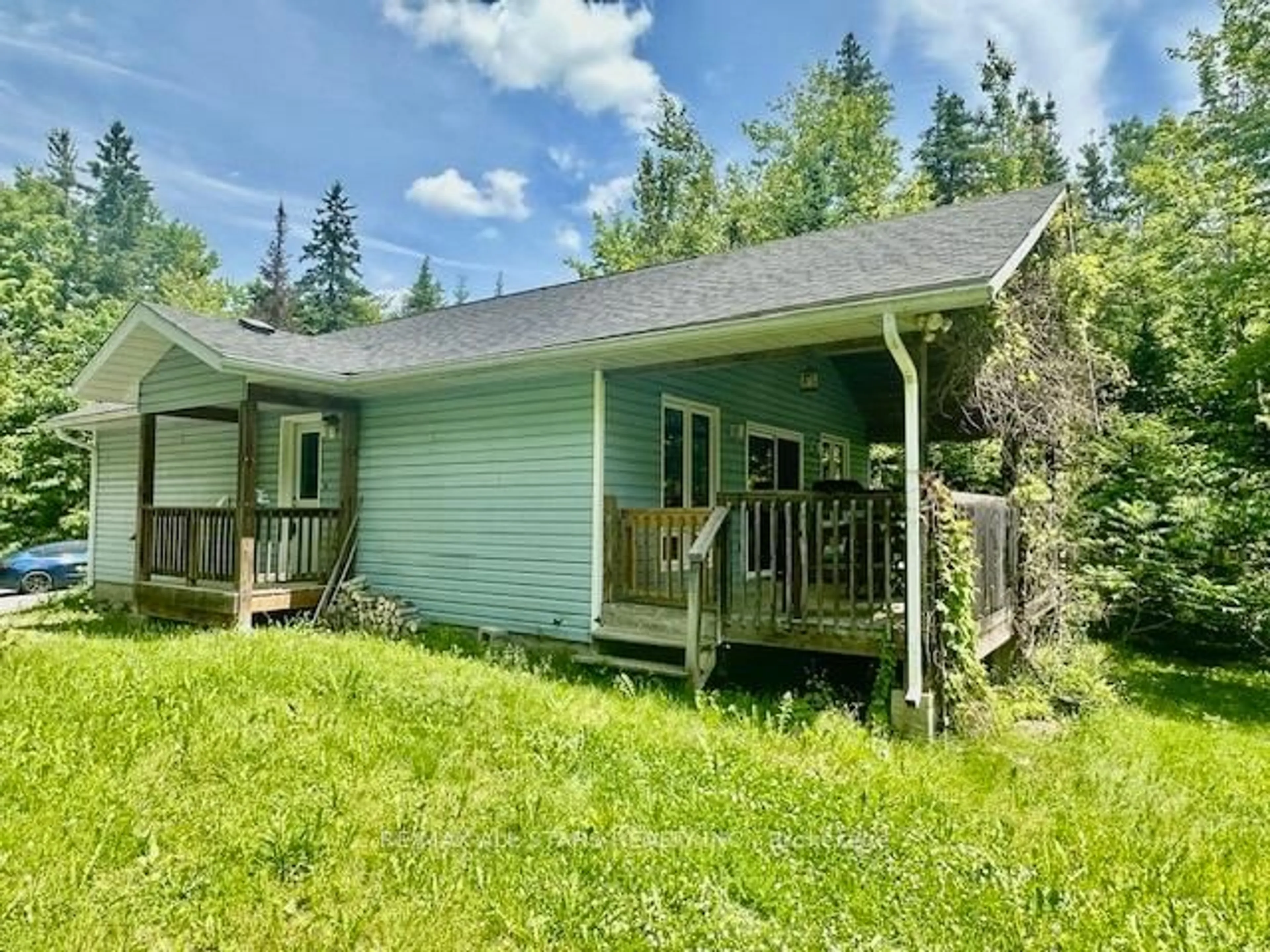 A pic from outside/outdoor area/front of a property/back of a property/a pic from drone, unknown for 33 Edwina Dr, Trent Lakes Ontario K0M 1A0