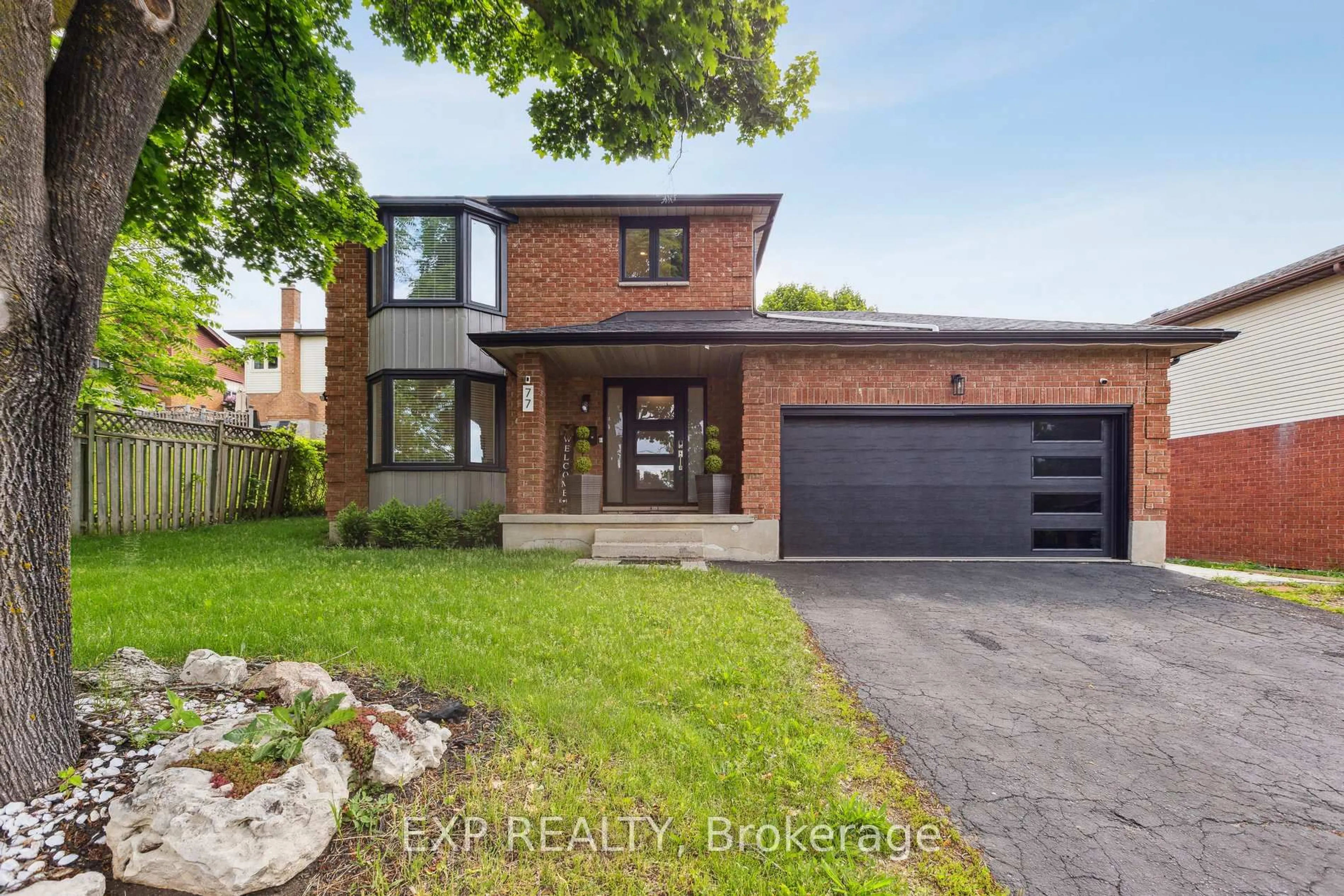 Home with brick exterior material, street for 77 Imperial Rd, Guelph Ontario N1H 8A1