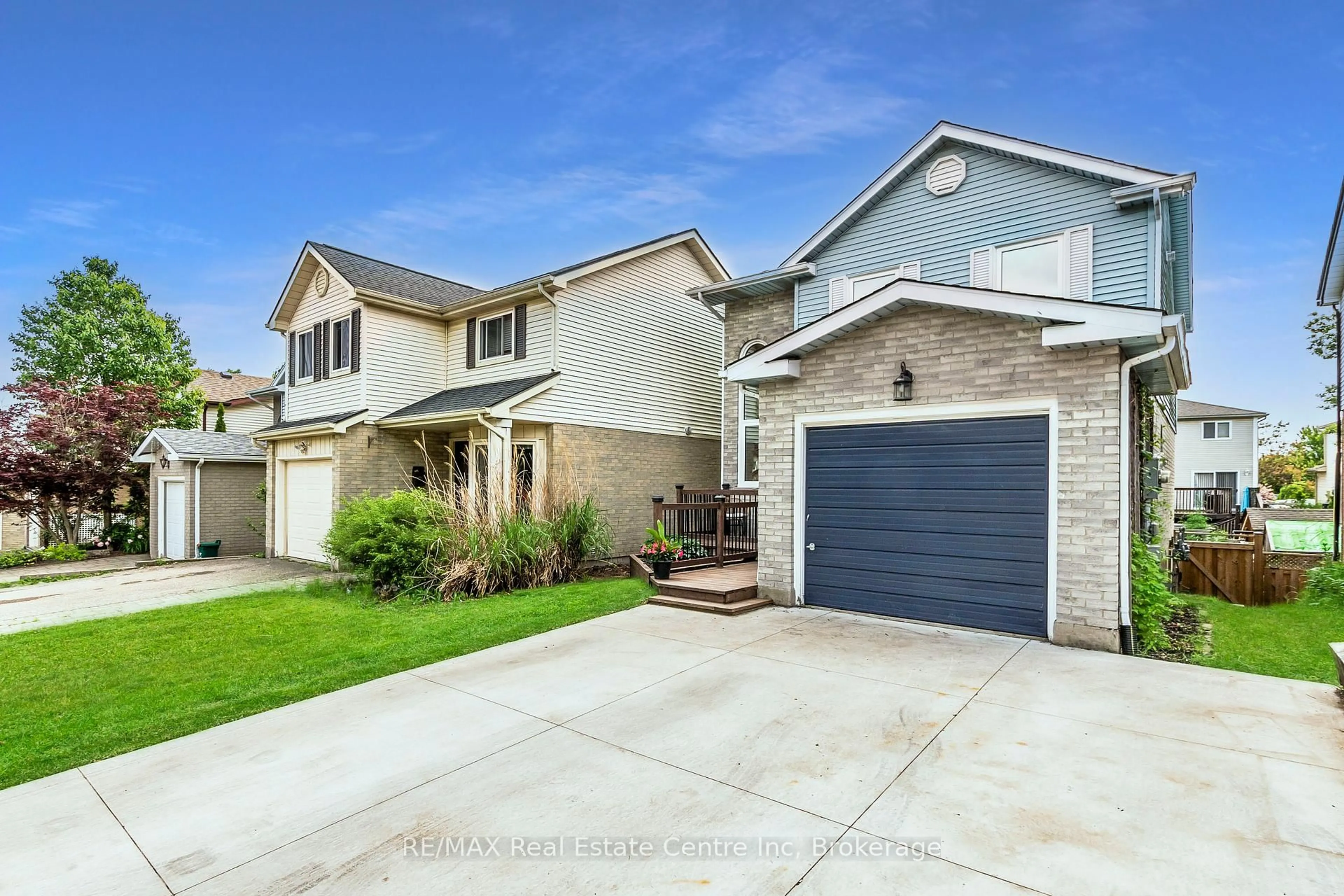 Home with brick exterior material, street for 519B Rosemeadow Cres, Waterloo Ontario N2T 2A5