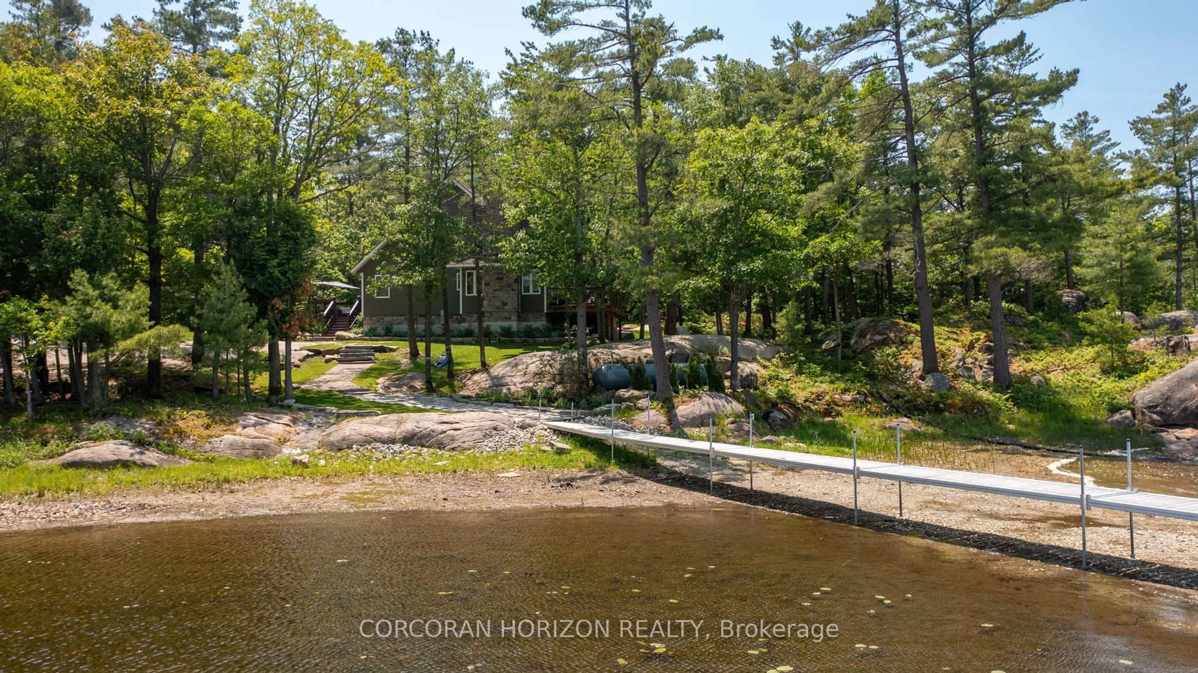 A pic from outside/outdoor area/front of a property/back of a property/a pic from drone, water/lake/river/ocean view for 100 ISLAND 630 GEORGIAN BAY, Georgian Bay Ontario P0E 1E0