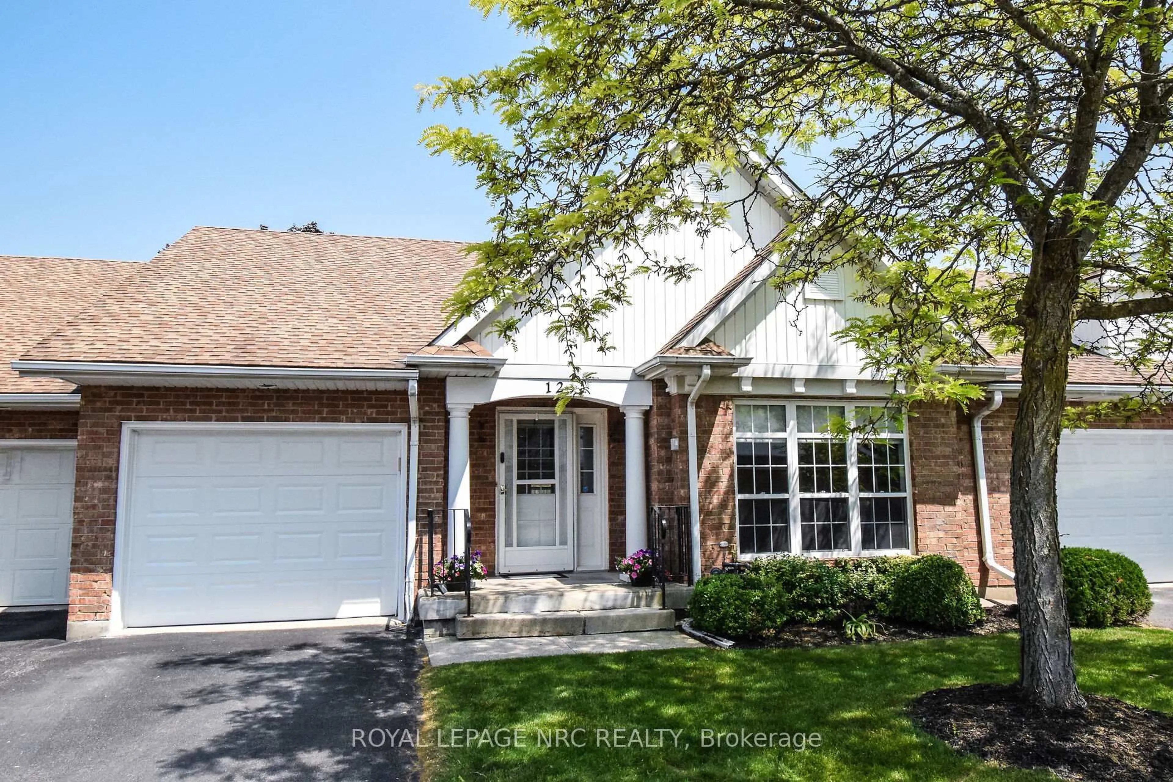 Home with brick exterior material, street for 2684 Mewburn Rd #12, Niagara Falls Ontario L2J 0A9