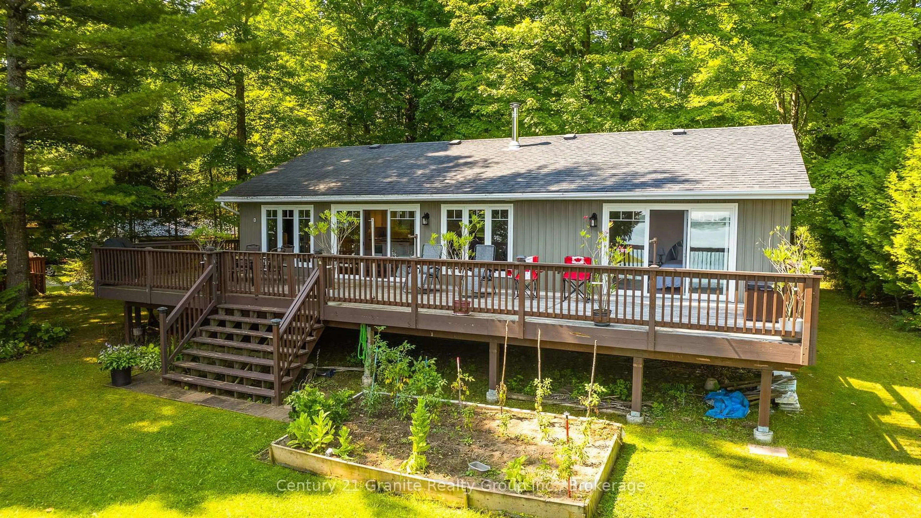 A pic from outside/outdoor area/front of a property/back of a property/a pic from drone, water/lake/river/ocean view for 122 Suter Dr, Kawartha Lakes Ontario K0M 2B0