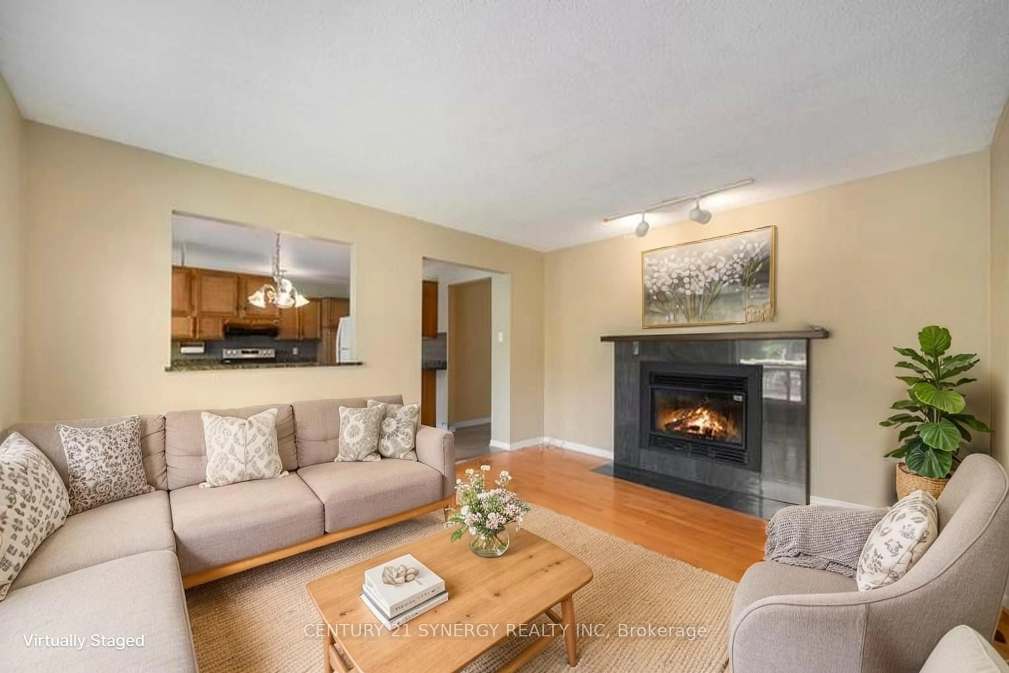 Living room with furniture, wood/laminate floor for 92 Nestow Dr, Ottawa Ontario K2G 4L8