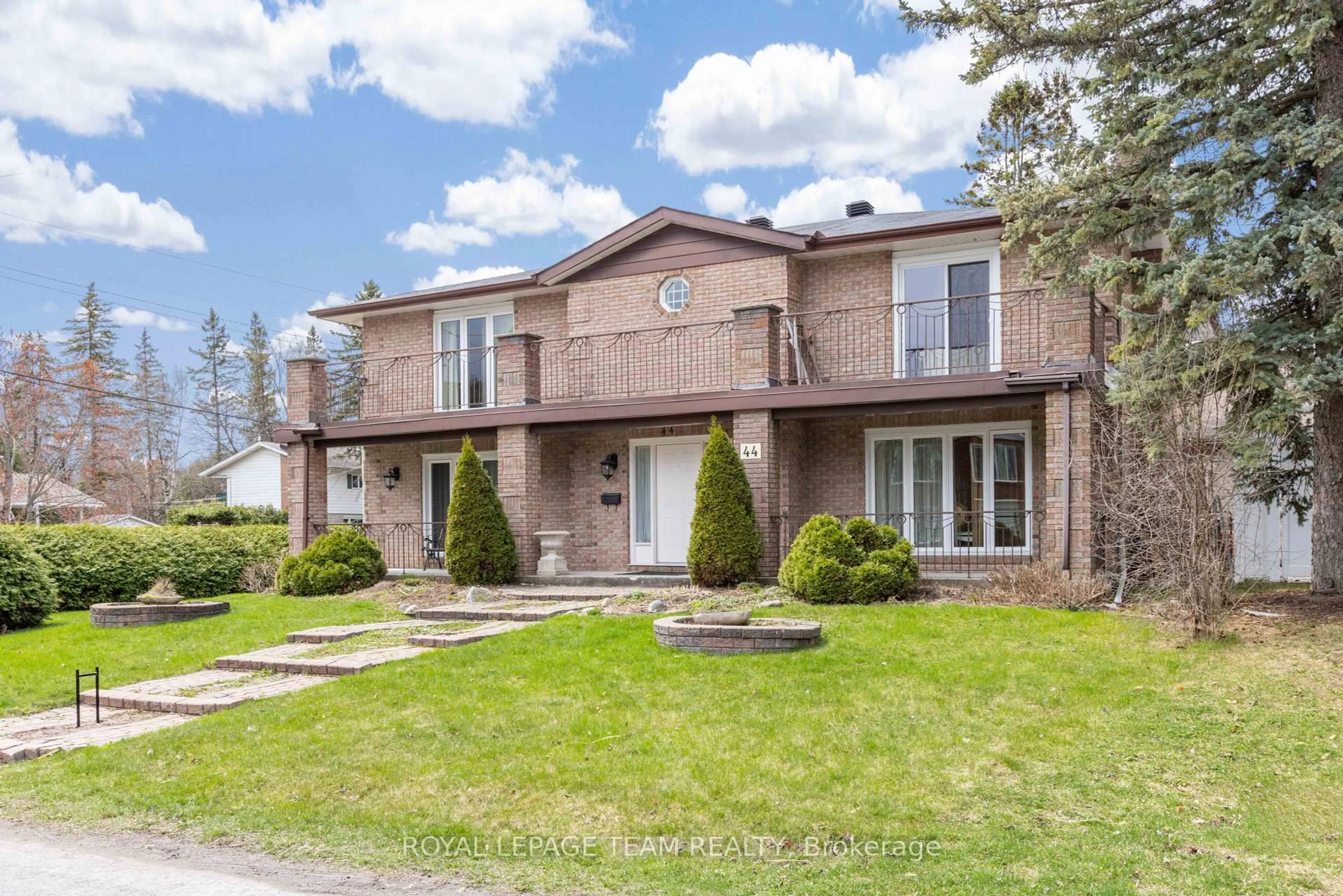 Home with brick exterior material, street for 44 Sycamore Dr, Ottawa Ontario K2H 8K3