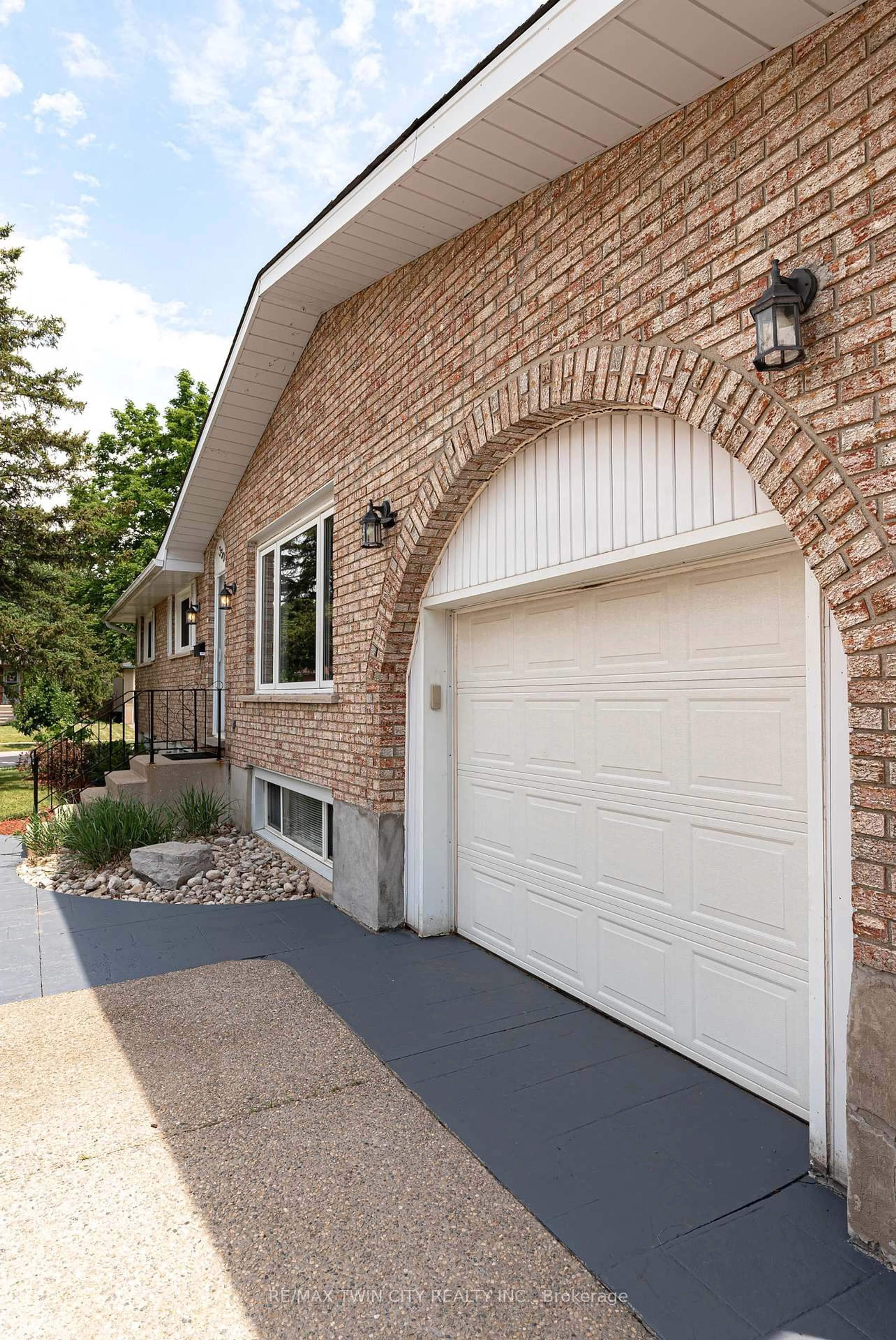 Home with brick exterior material, street for 330 Martindale Cres, Waterloo Ontario N2L 4X8